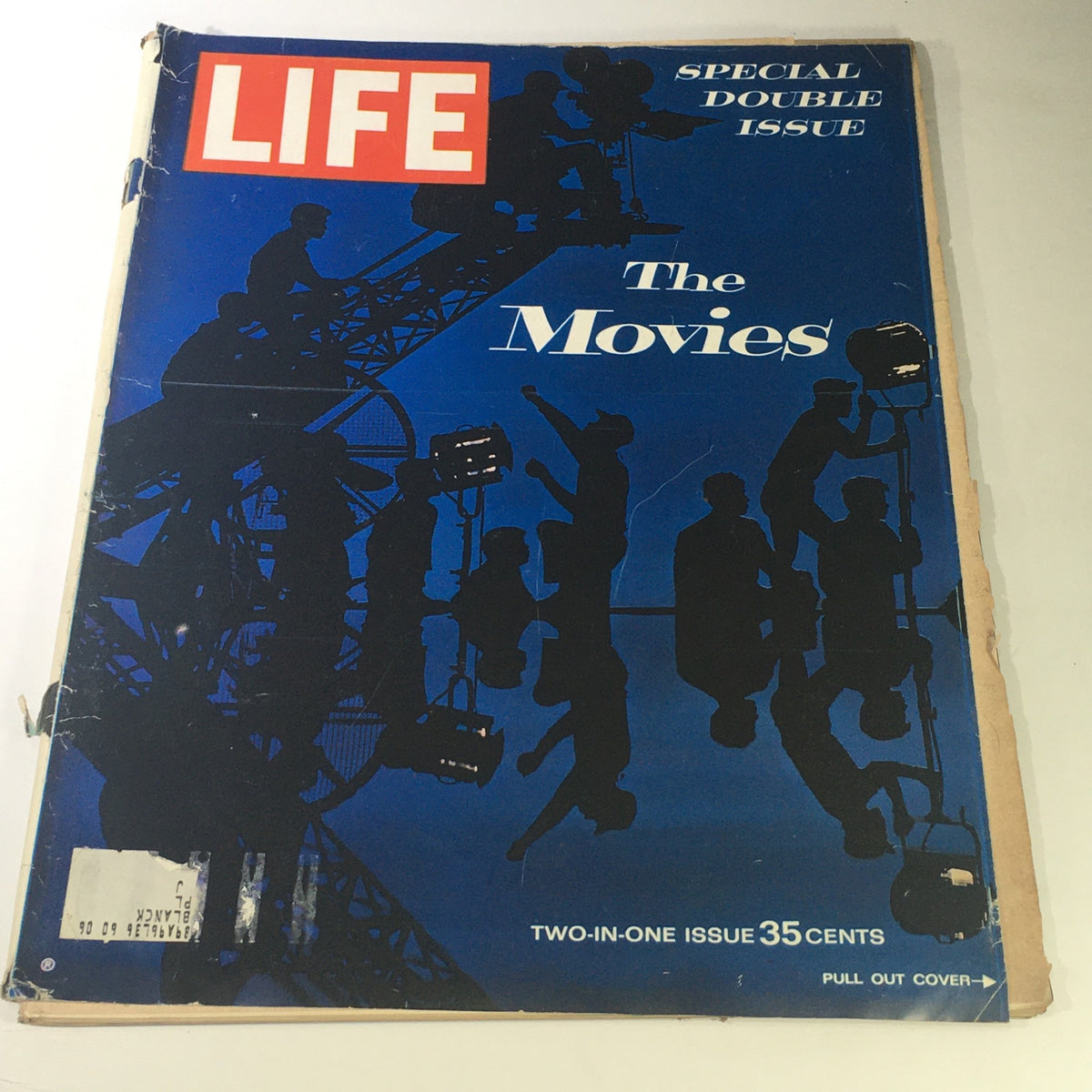 Cover of VTG Life Magazine December 20 1963 - Special Double Issue on The Movies, featuring silhouettes of film crew members and movie lights.