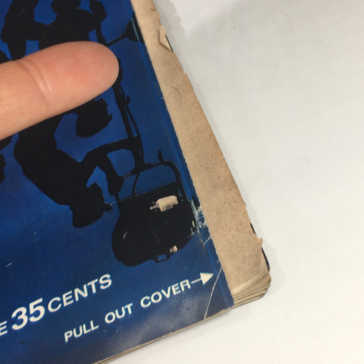 Close-up of the edge of the VTG Life Magazine from December 20, 1963, highlighting minor wear and an address label on the cover, indicative of its vintage condition and appeal for collectors.