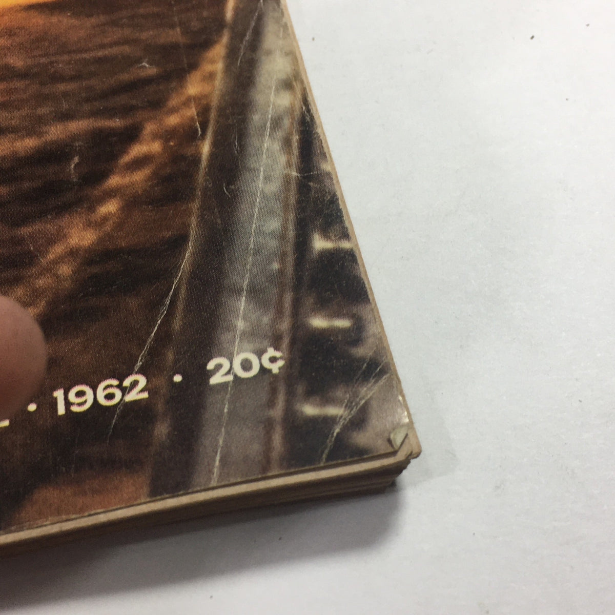Close-up image of the spine of the VTG Life Magazine March 2 1962, displaying vintage price and condition details, emphasizing its collectible nature.