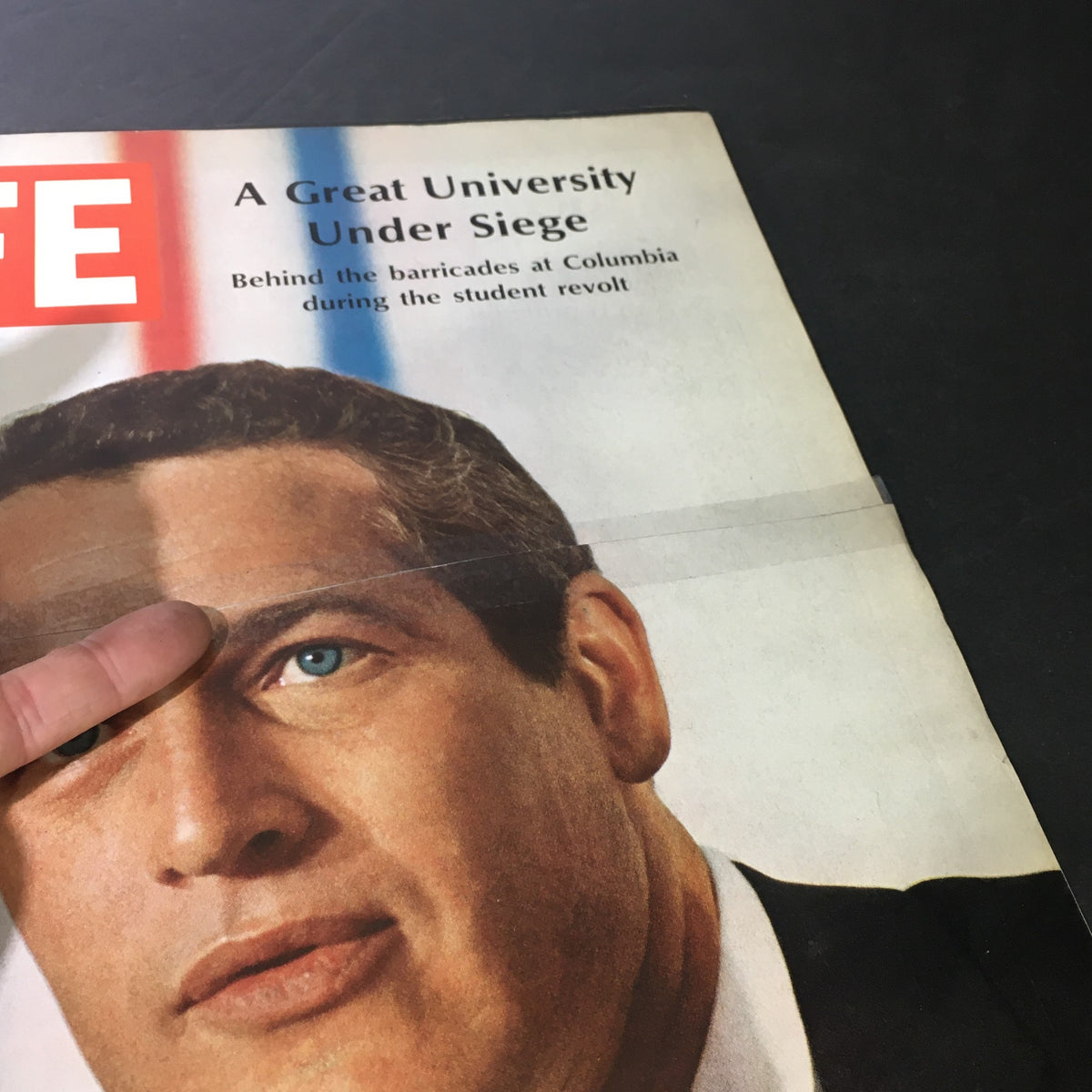Another angle of the vintage Life Magazine cover from May 10, 1968, showcasing Paul Newman alongside the headline 'A Great University Under Siege' linked to political activism.