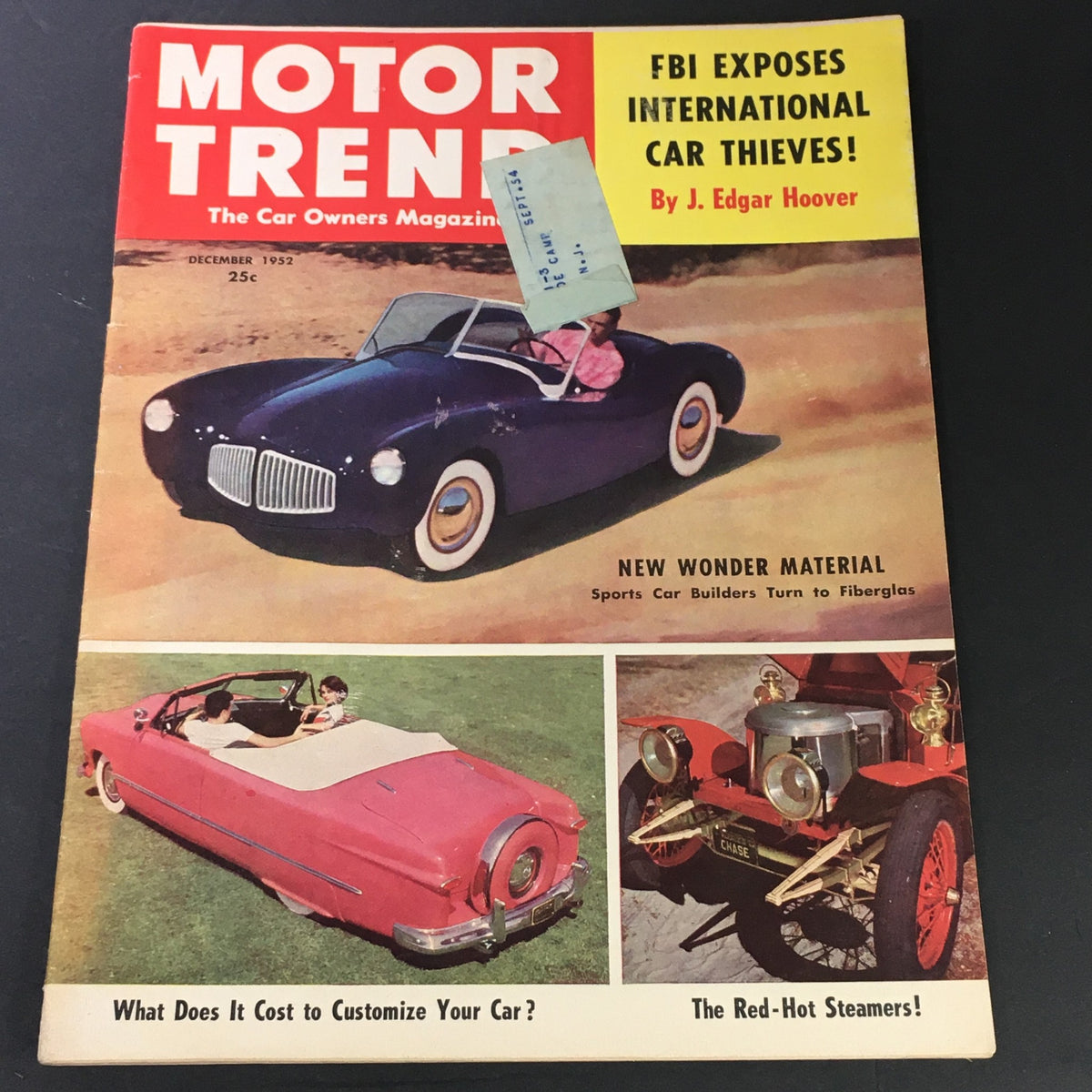 Cover of Motor Trend Magazine December 1952 featuring the headline 'FBI Exposes International Car Thieves!' by J. Edgar Hoover, showcasing a vintage car and articles on car customization and materials used in sports car construction.