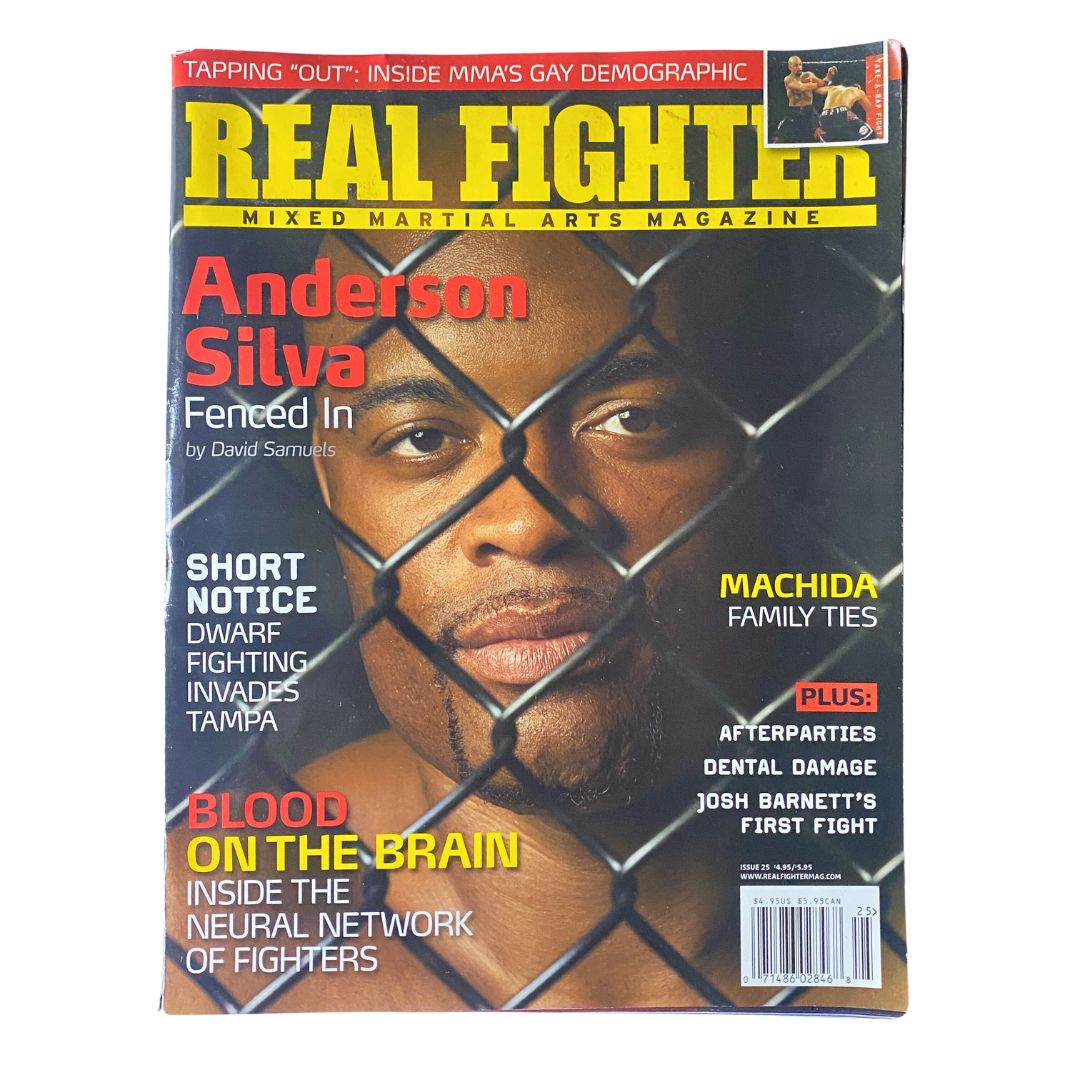 Cover of Real Fighter Magazine 2009 No. 25 featuring Anderson Silva, showcasing his profile within a cage, emphasizing his stature in MMA.