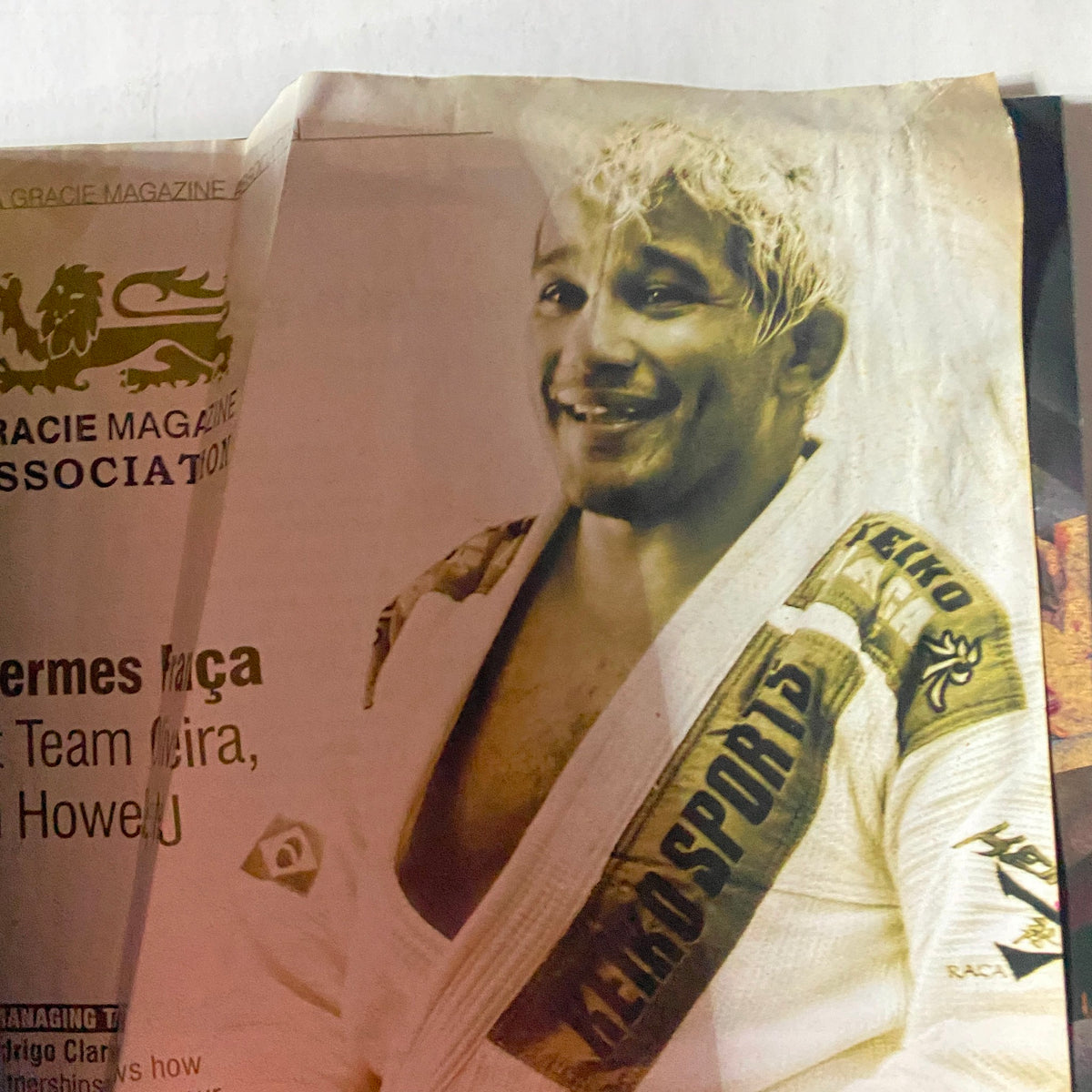 Interior page of Gracie Magazine October 2010 No. 162 showcasing a smiling Brazilian Jiu-Jitsu practitioner in a gi, emphasizing the sport's culture.
