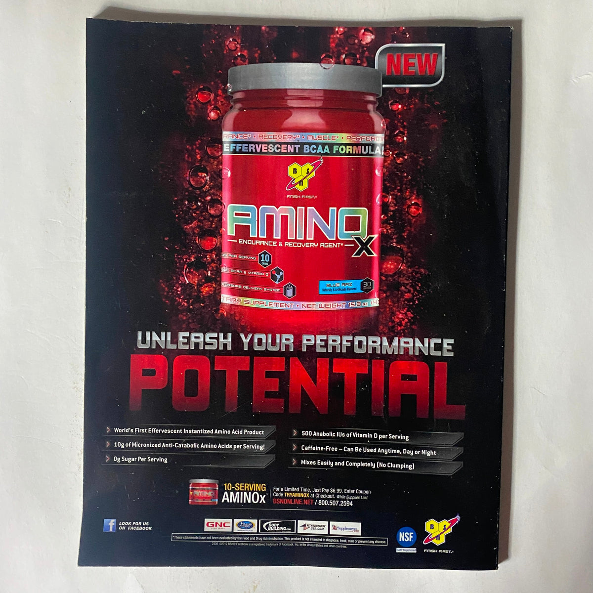 Advertisement for Amino-X, a performance enhancing supplement featuring a vibrant design and details about its benefits for athletes, alongside the Fight! Magazine February 2012 theme.