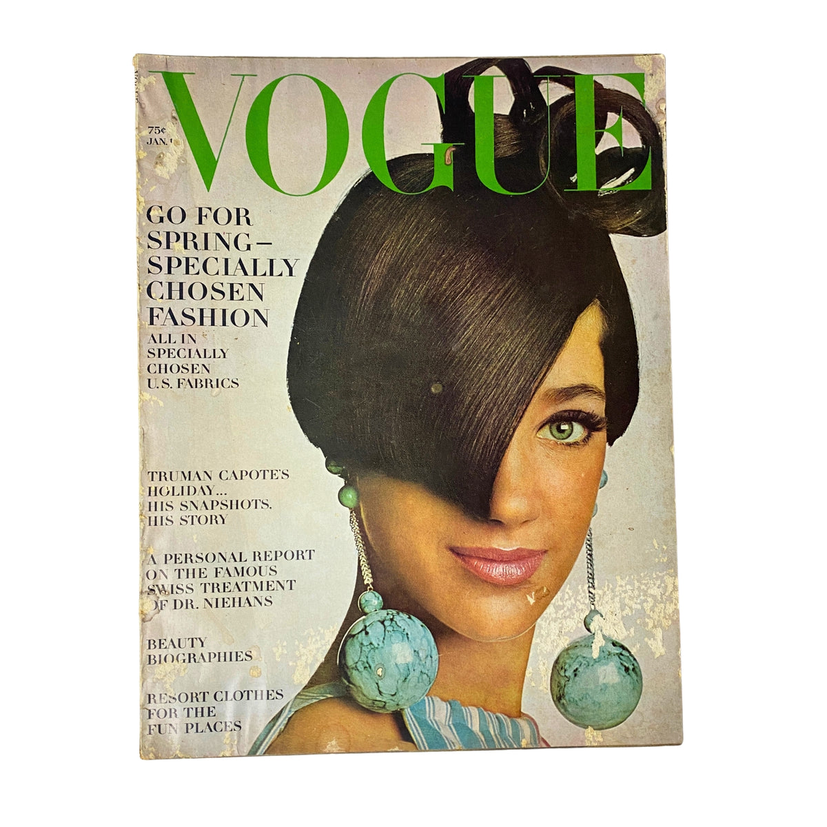 Vogue Magazine January 15, 1966 featuring Marisa Berenson on the cover, showcasing mid-1960s fashion with a focus on spring styles and unique accessories.