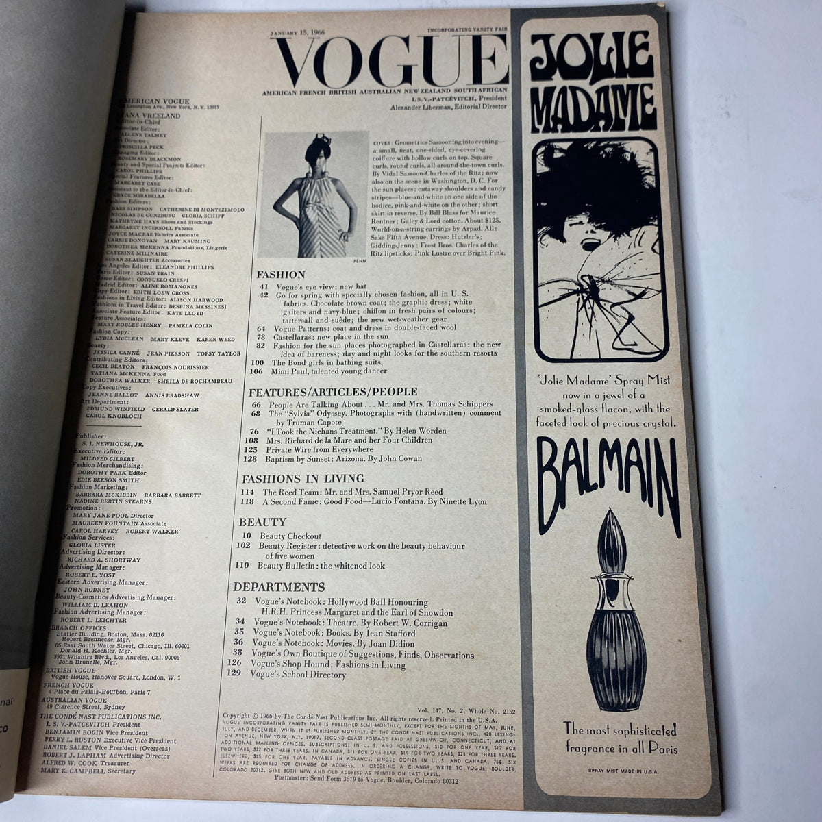Interior page of Vogue Magazine January 15, 1966 featuring fashion listings and advertisements including a Balmain perfume ad.