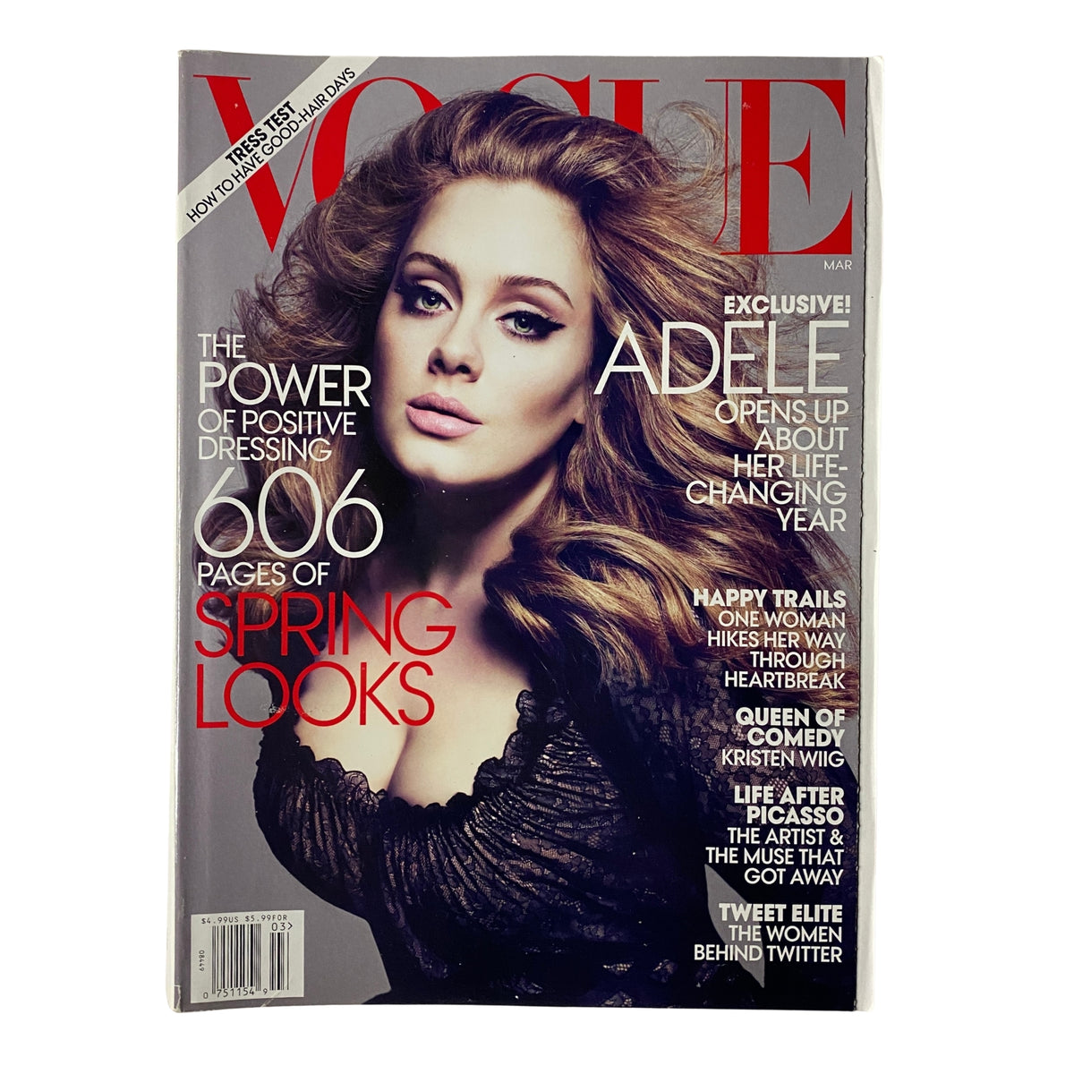 Vogue Magazine March 2012 Adele Cover showcasing the iconic singer with voluminous hair and striking makeup, emphasizing the magazine's theme of positive dressing with 606 pages of spring looks.