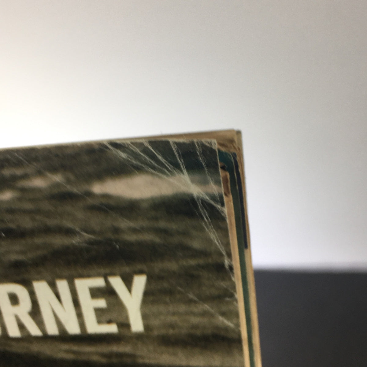 Detail of the top edge of Life Magazine, April 2, 1965, showing minor wear and the title 'Journey' from 'Gemini's Journey'.