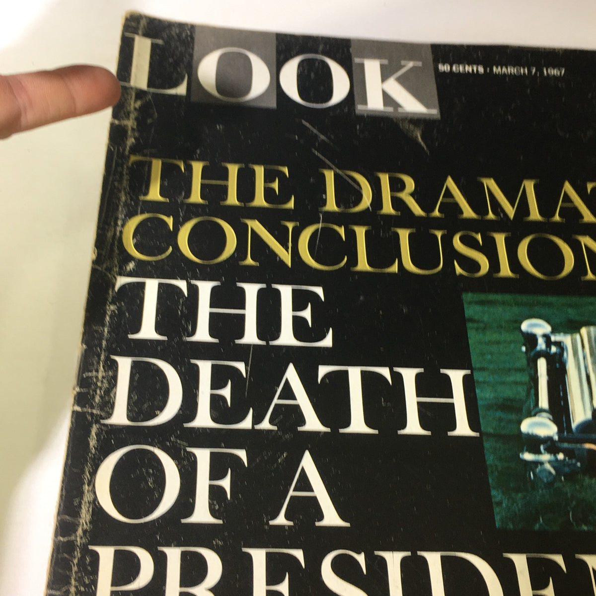 Close-up view of the cover of VTG Look Magazine March 7, 1967, showcasing the title 'The Dramatic Conclusion of The Death of a President' with an image of a casket, representing critical historical themes.