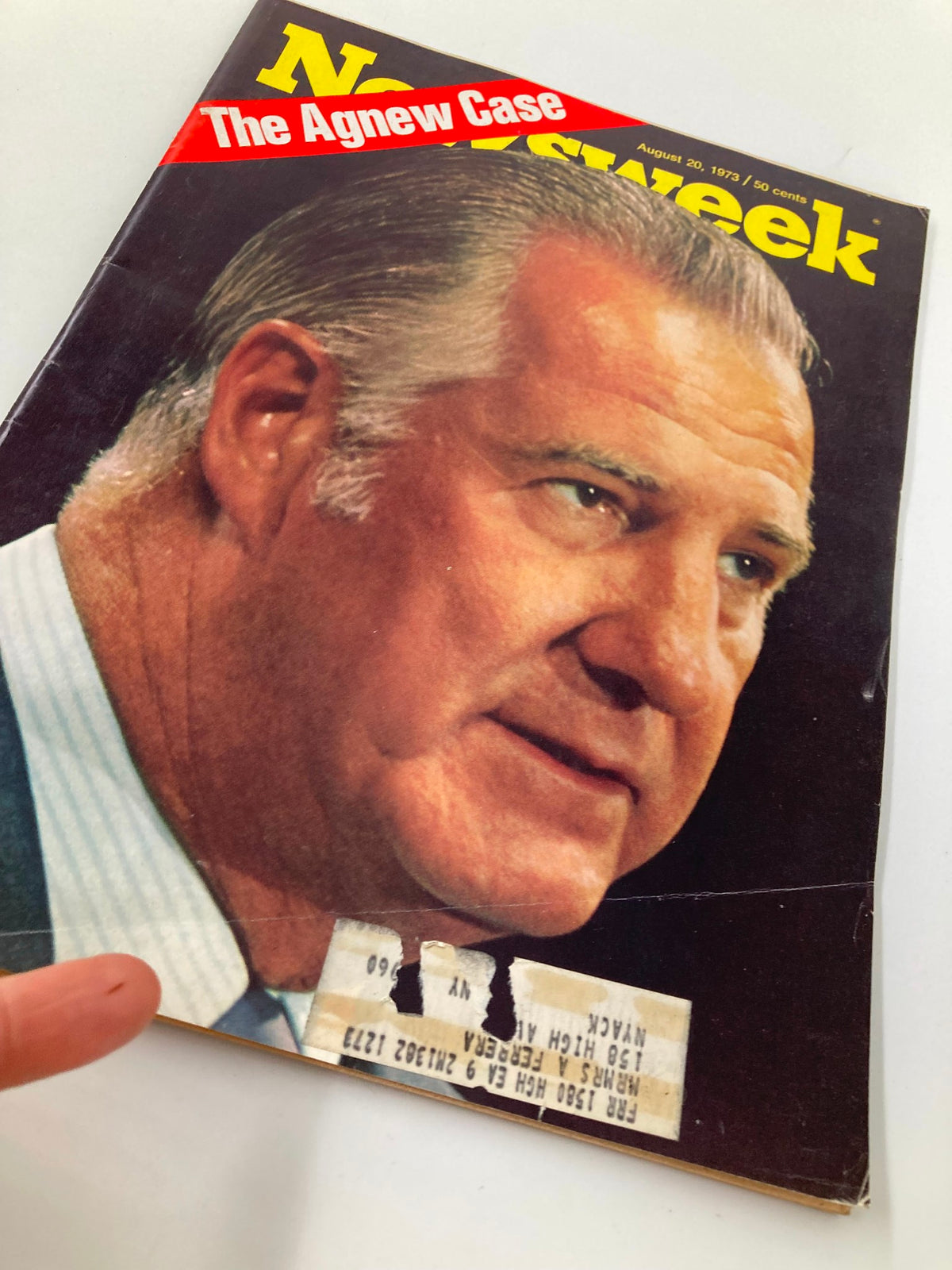 Close-up view of the vintage Newsweek magazine cover dated August 20, 1973, showcasing the title 'The Agnew Case' along with visible wear and a price tag, capturing a significant moment in American political history.