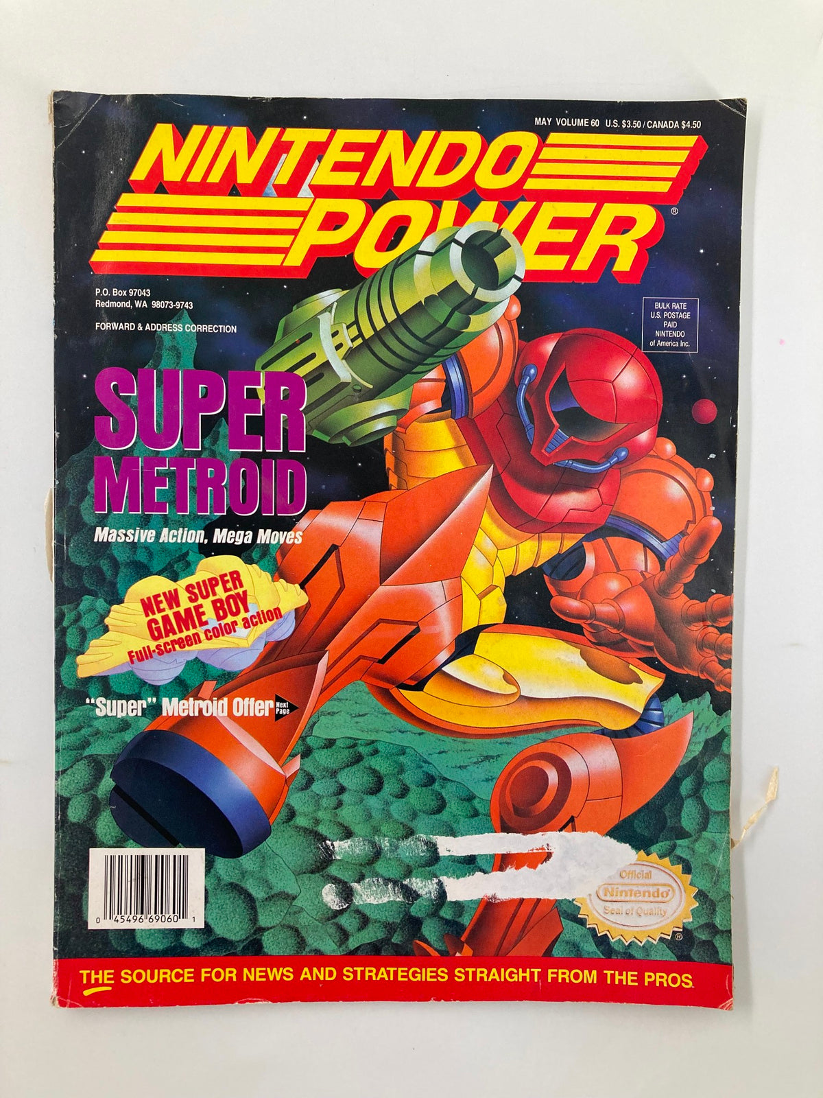 Cover of Nintendo Power Magazine May 1994 Vol. 60 featuring Super Metroid, showcasing Samus Aran in action, with visual highlights like the Nintendo Seal of Quality and the tag line 'Massive Action, Mega Moves'.