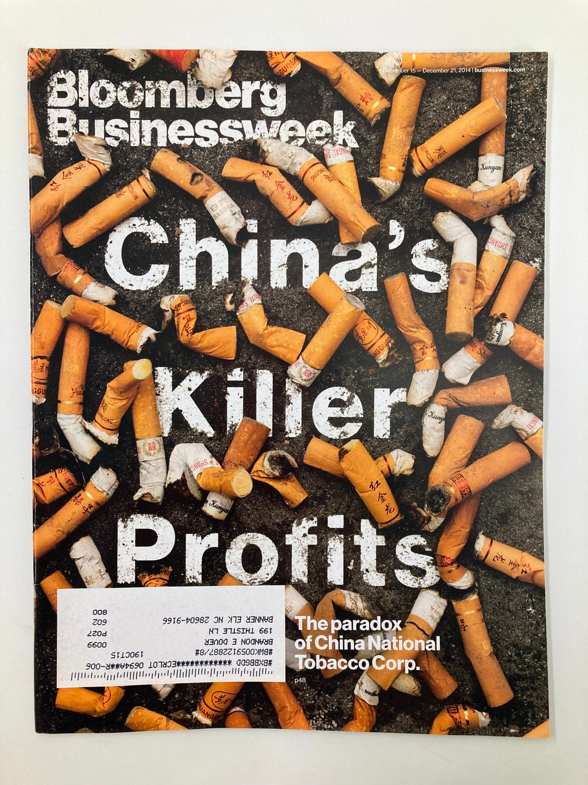Bloomberg Businessweek magazine cover from December 15, 2014, titled 'China's Killer Profits,' featuring used cigarette butts symbolizing the paradox of China National Tobacco Corp.