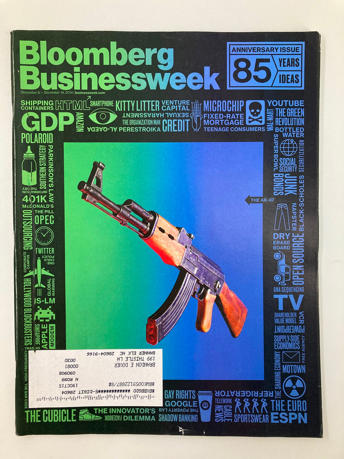 Bloomberg Businessweek Magazine December 8 2014 cover featuring the AK-47, highlighting themes of warfare and agricultural innovations.