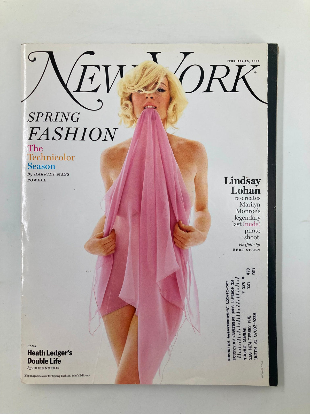 Cover of New York Magazine dated February 25, 2008, featuring Lindsay Lohan recreating Marilyn Monroe's iconic last photo. The image showcases Lohan in a striking pose, draped in a sheer pink fabric, exemplifying the blend of classic and contemporary celebrity culture.