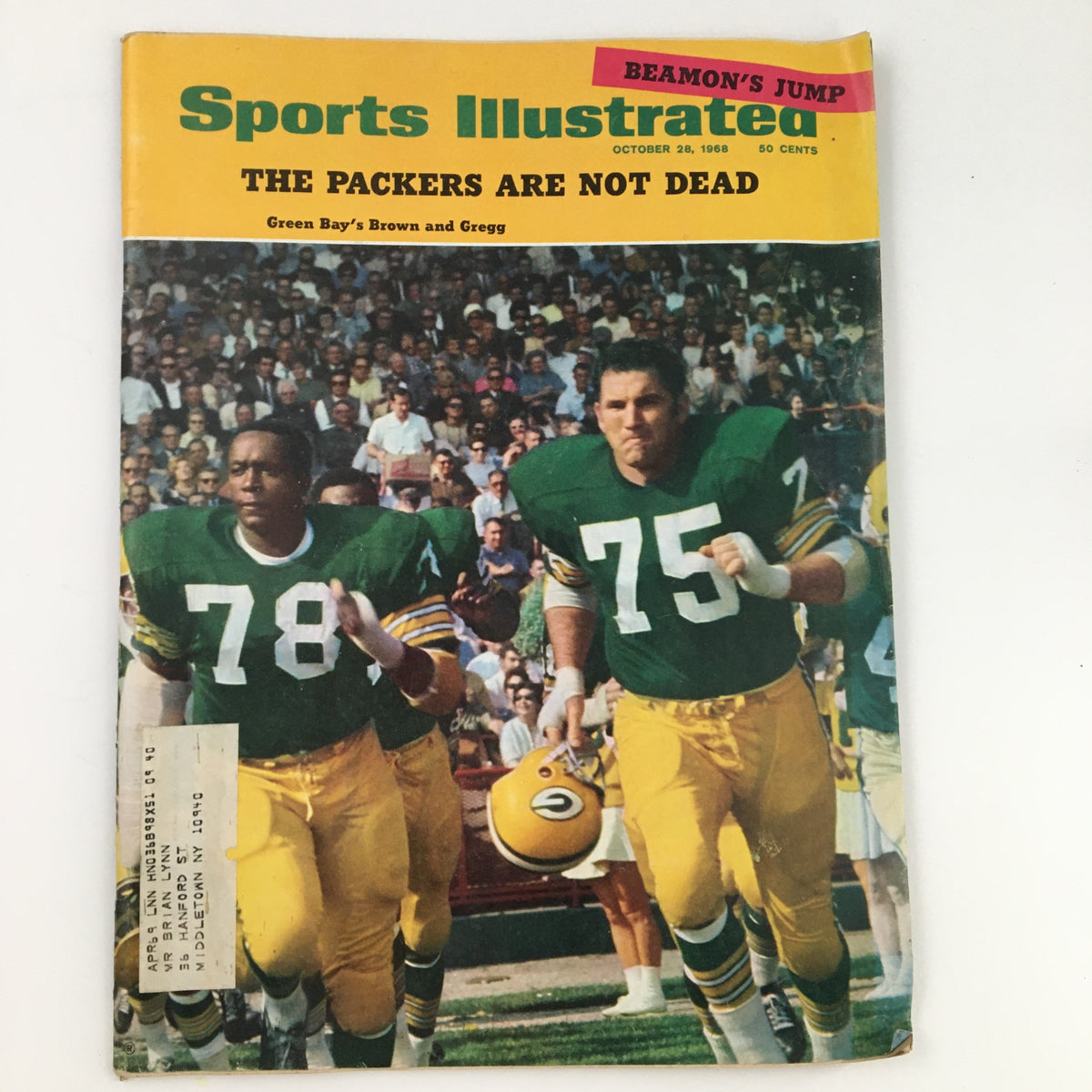 Cover of Sports Illustrated Magazine dated October 28, 1968, featuring Green Bay Packers players Bob Brown and Forrest Gregg with the headline 'THE PACKERS ARE NOT DEAD'. This collectible issue reflects a significant era in NFL history.