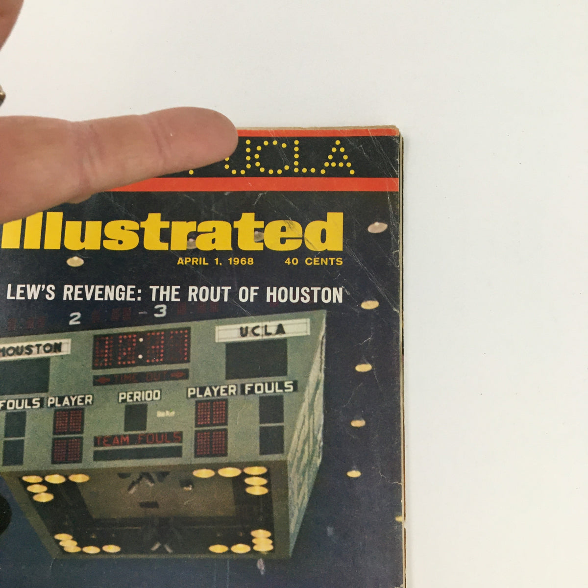 Sports Illustrated Magazine dated April 1, 1968, featuring Lew Alcindor, aka Kareem Abdul-Jabbar on the cover, showcasing the headline 'Lew's Revenge: The Rout of Houston' with a scoreboard background that highlights UCLA versus Houston.