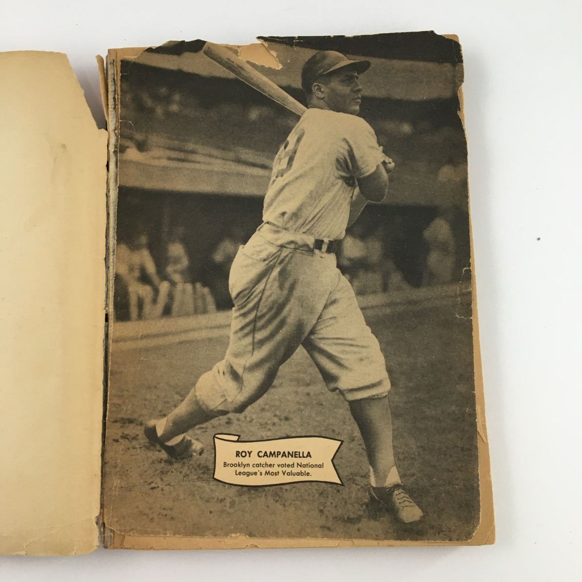 Black and white photograph of Roy Campanella, the legendary catcher from the Brooklyn Dodgers, featured in the 1952 Major League Baseball Official Rules & Stories.