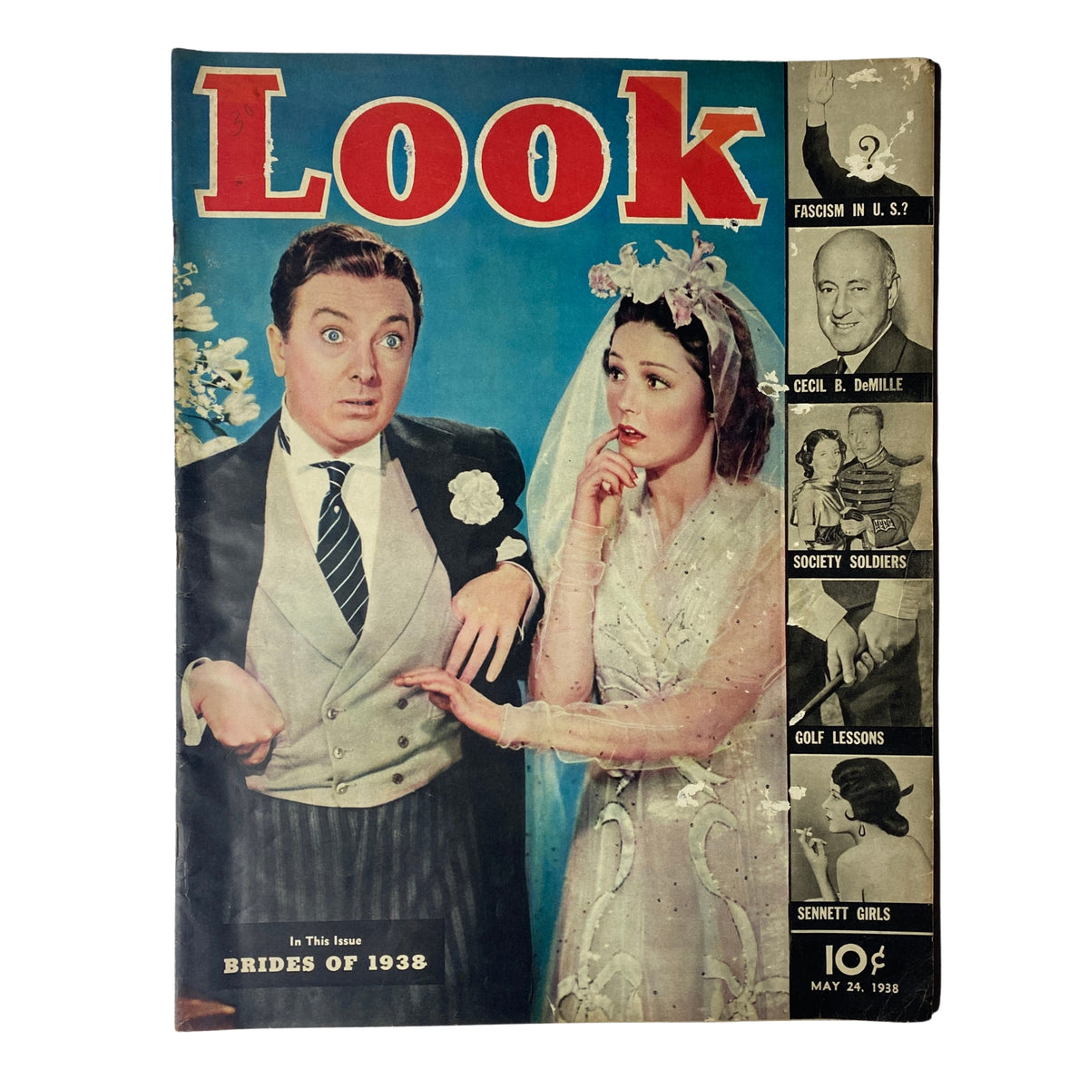 Cover of Look Magazine dated May 24, 1938 featuring the title 'The Brides of 1938', showcasing a wedding scene with a surprised groom and a bride in a vintage wedding dress, capturing the style and themes of early 20th century bridal fashion.