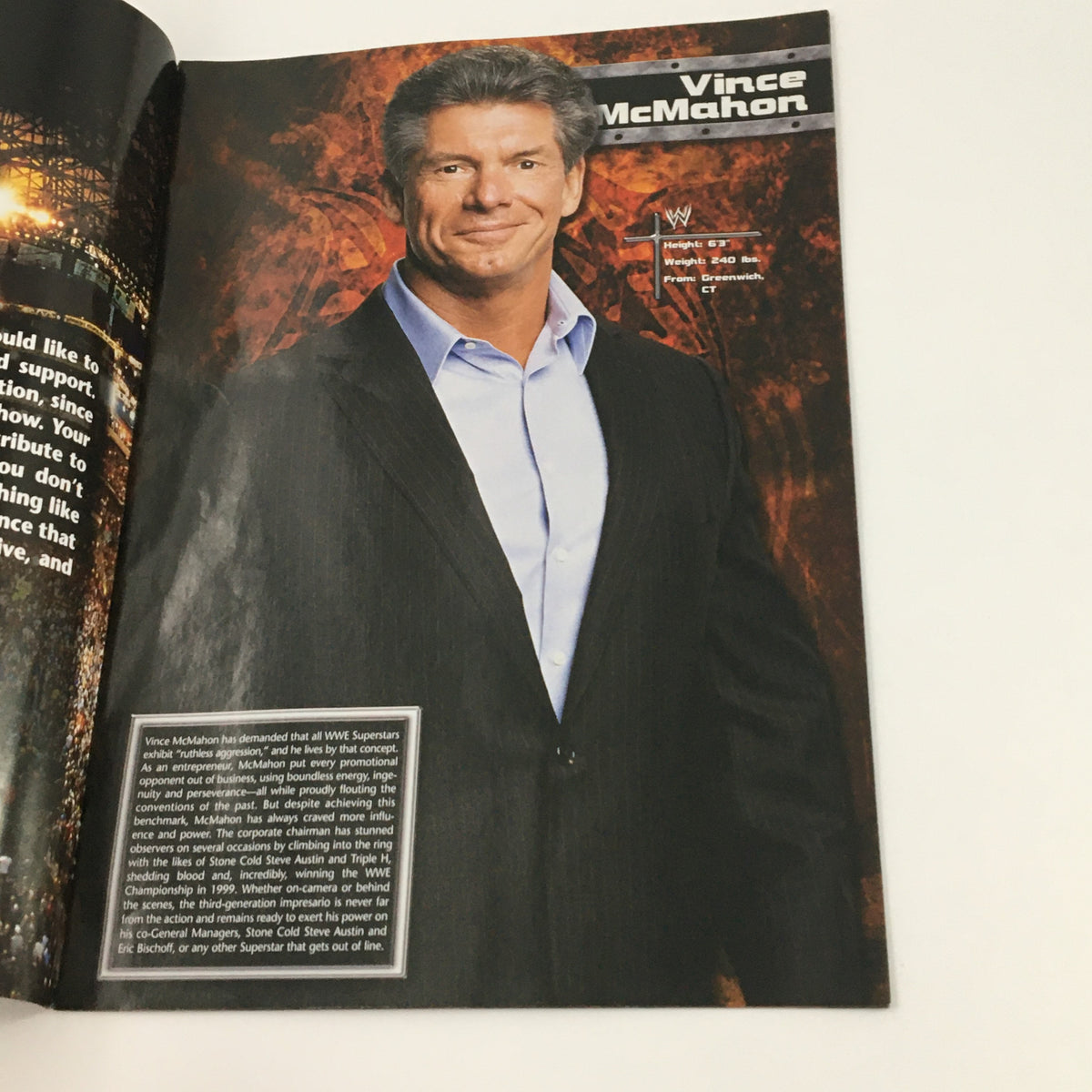 Interior page of WWE Raw Magazine 2003 featuring Vince McMahon, detailing his impact on professional wrestling and his role as a significant character in WWE. This page celebrates his contributions to the industry.
