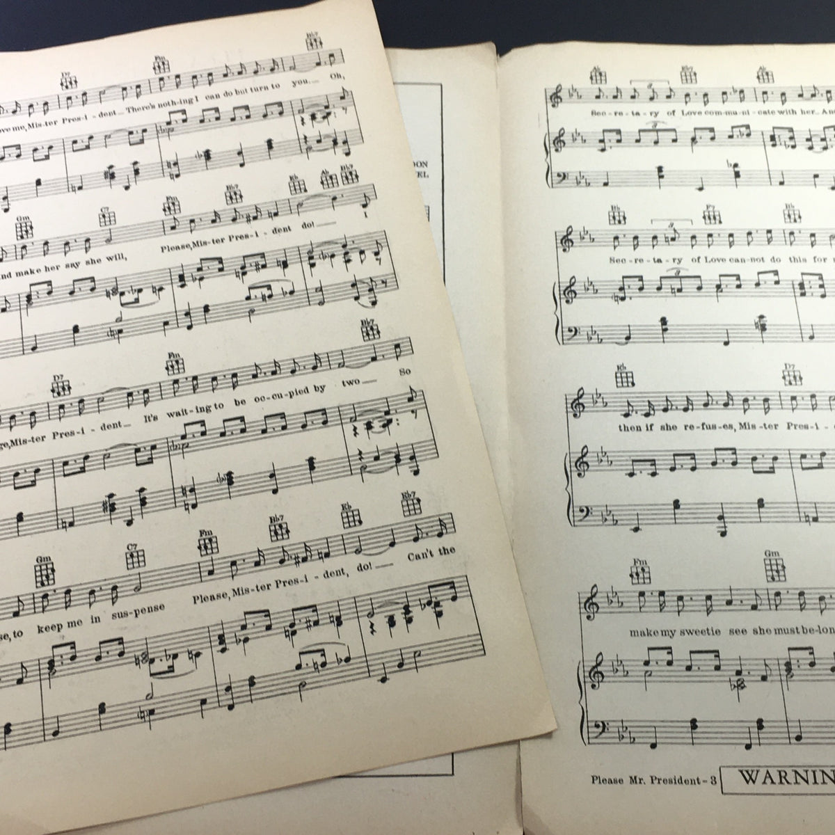 Sheet music pages from 'Please Mister President' showing musical notes and lyrics from the 1933 vintage record.