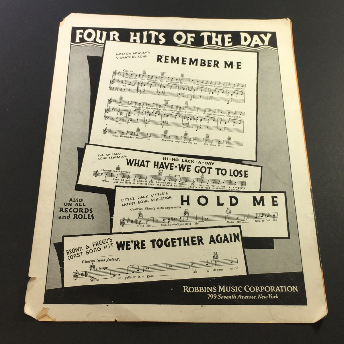 Vintage sheet music cover featuring 'I'm Thru Saying I'm Thru' by Bert Kalmar and Gus Kahn, showcasing four hits including 'Remember Me' and 'Hold Me'. The sheet music is published by Robbins Music Corporation in 1931.