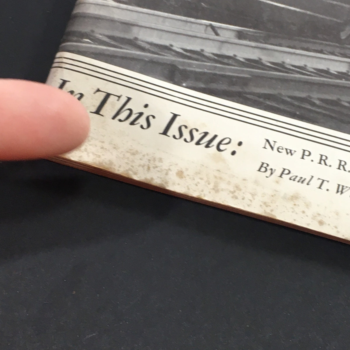 Cover detail of the vintage magazine 'VTG The Mutual Magazine April 1936', showcasing the section header 'In This Issue: New P.R.R. R.R.' with a person's finger pointing at the text.