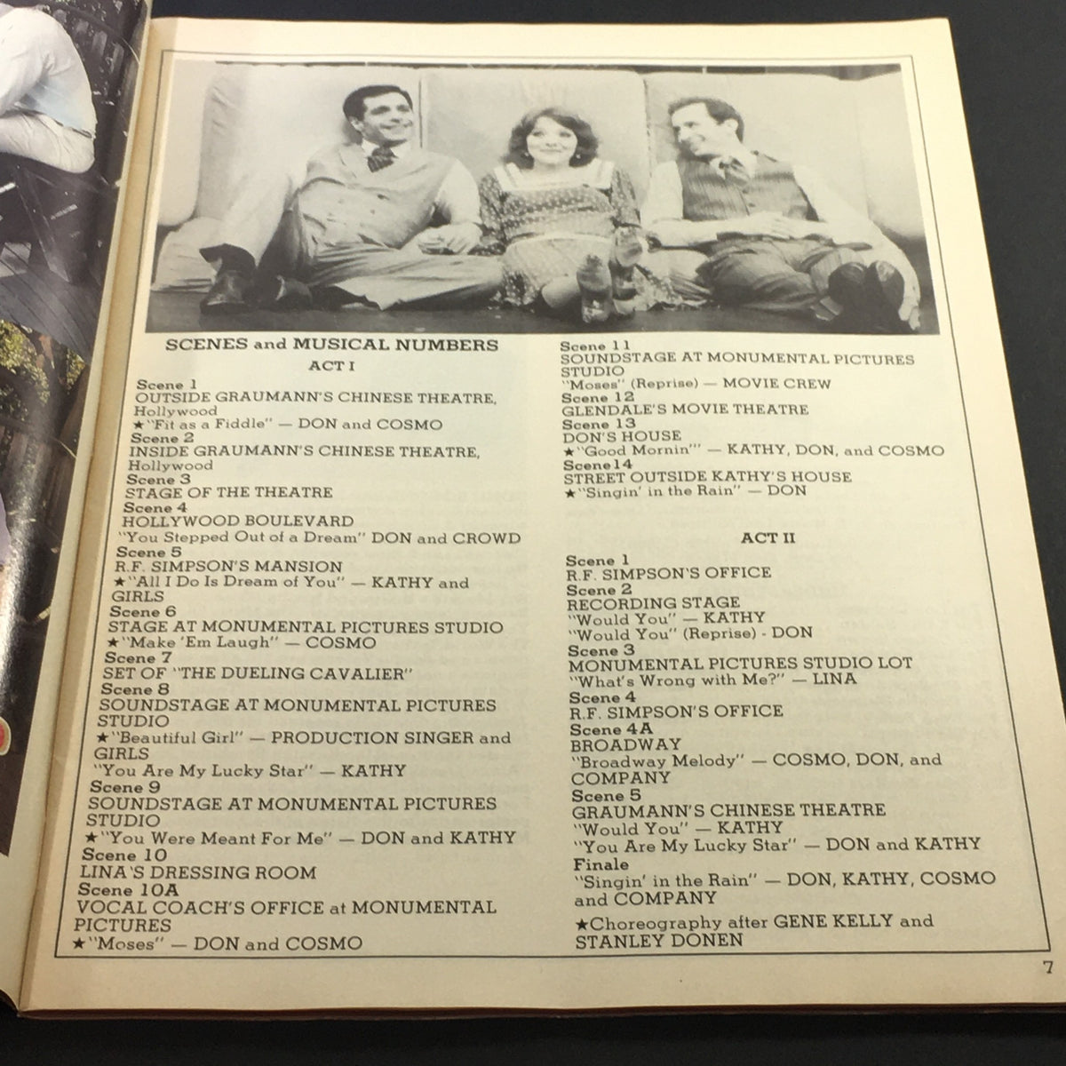 Scene listing from the VTG Performance Theatre Magazine July-August 1986, detailing musical numbers from the Singin' in the Rain Broadway production.