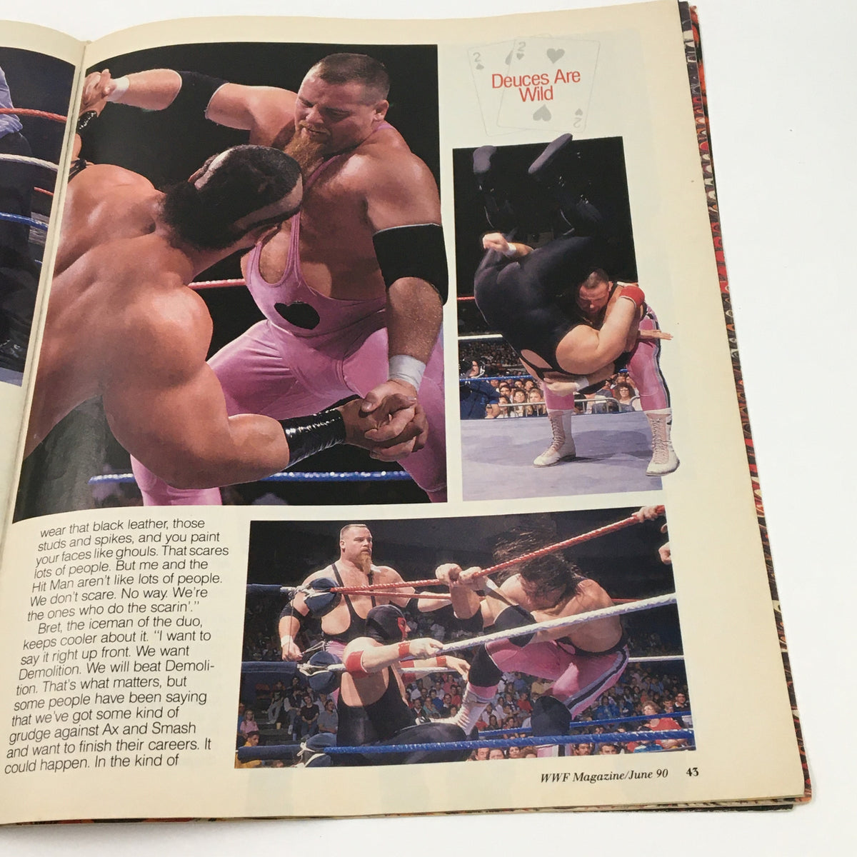 Page titled 'Deuces Are Wild' from June 1990 WWF Magazine featuring intense wrestling action and interviews with wrestling personalities.