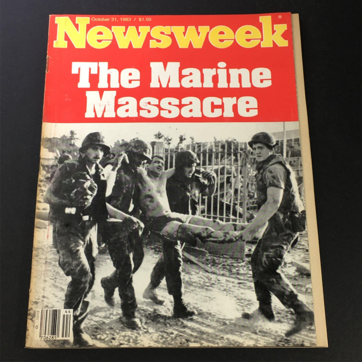 VTG Newsweek Magazine October 31, 1983 cover featuring 'The Marine Massacre' with a striking black and white photo of soldiers carrying a wounded individual.