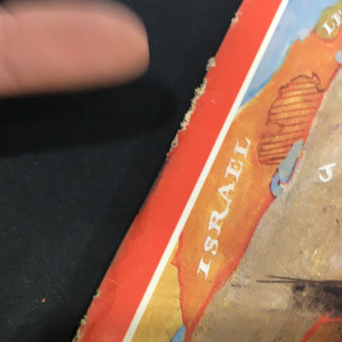Detailed view of the side edge of Time Magazine from December 19, 1983, displaying the title and geographical mentions including Israel, featuring President Hafez Assad.