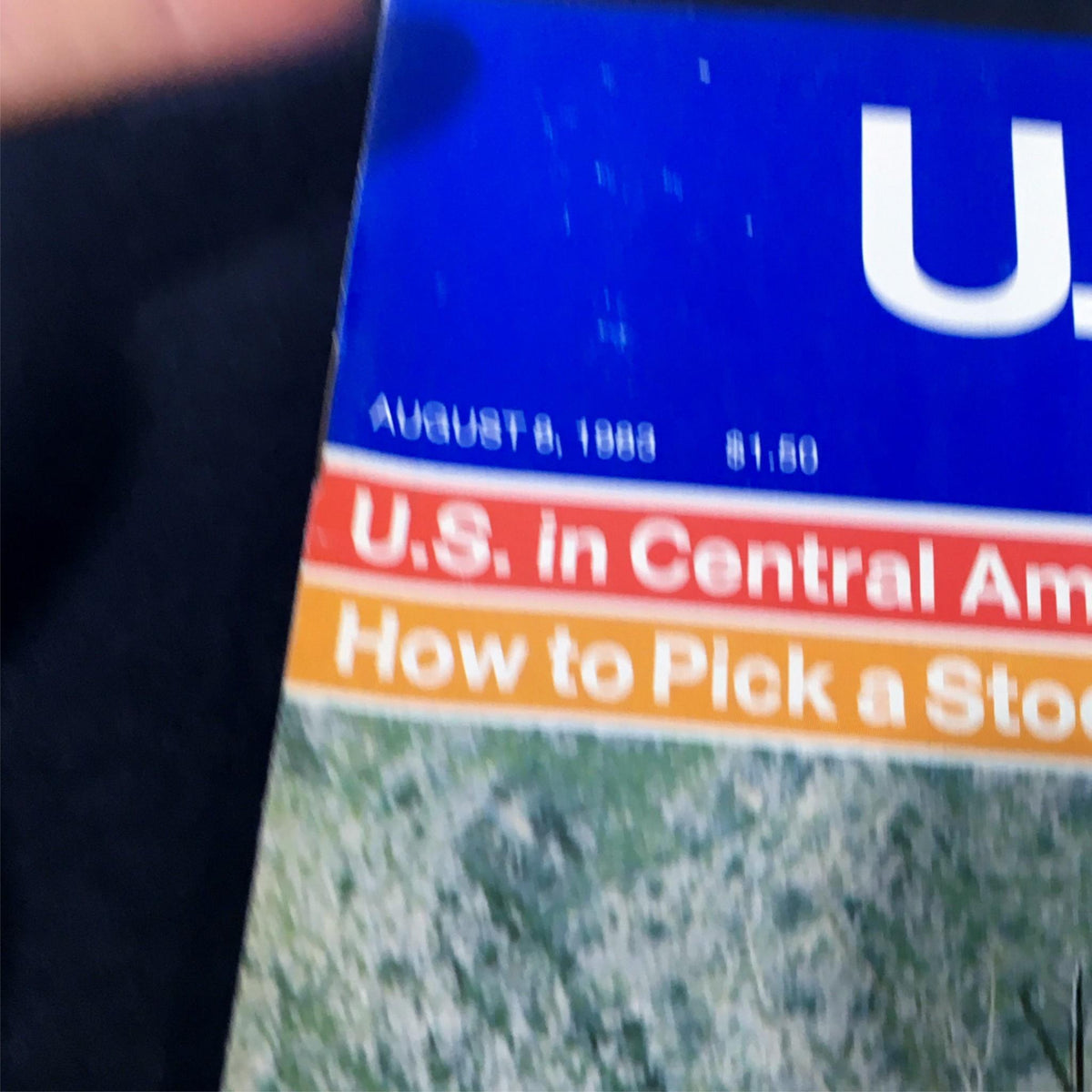 Close-up view of the U.S. News & World Report magazine from August 8, 1983, showcasing the title and additional headlines, including 'U.S. in Central America: Closer to War?' and 'How to Pick a Stock Today'.