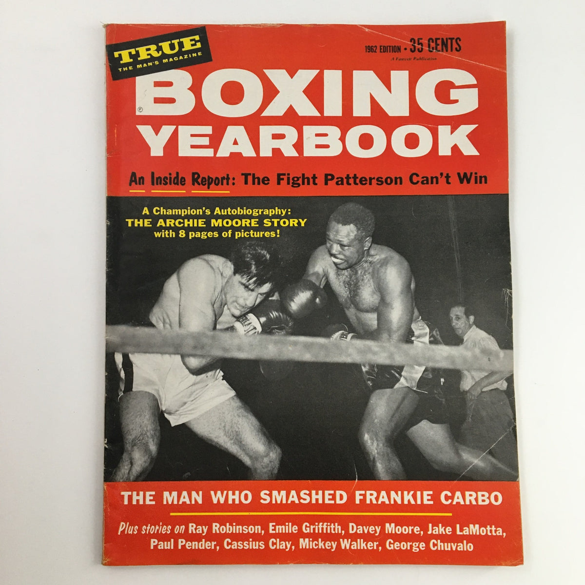 Cover of the True Magazine 1962 Boxing Yearbook, featuring The Archie Moore Story. The vibrant red and white title stands out against a dramatic boxing scene. The yearbook includes notable mentions of famous boxers.