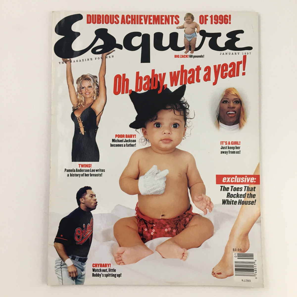 Esquire Magazine January 1997 cover featuring Pamela Anderson and a baby dressed in a black hat with the text 'Oh, baby what a year!'. The issue includes a cover story about Michael Jackson's baby.