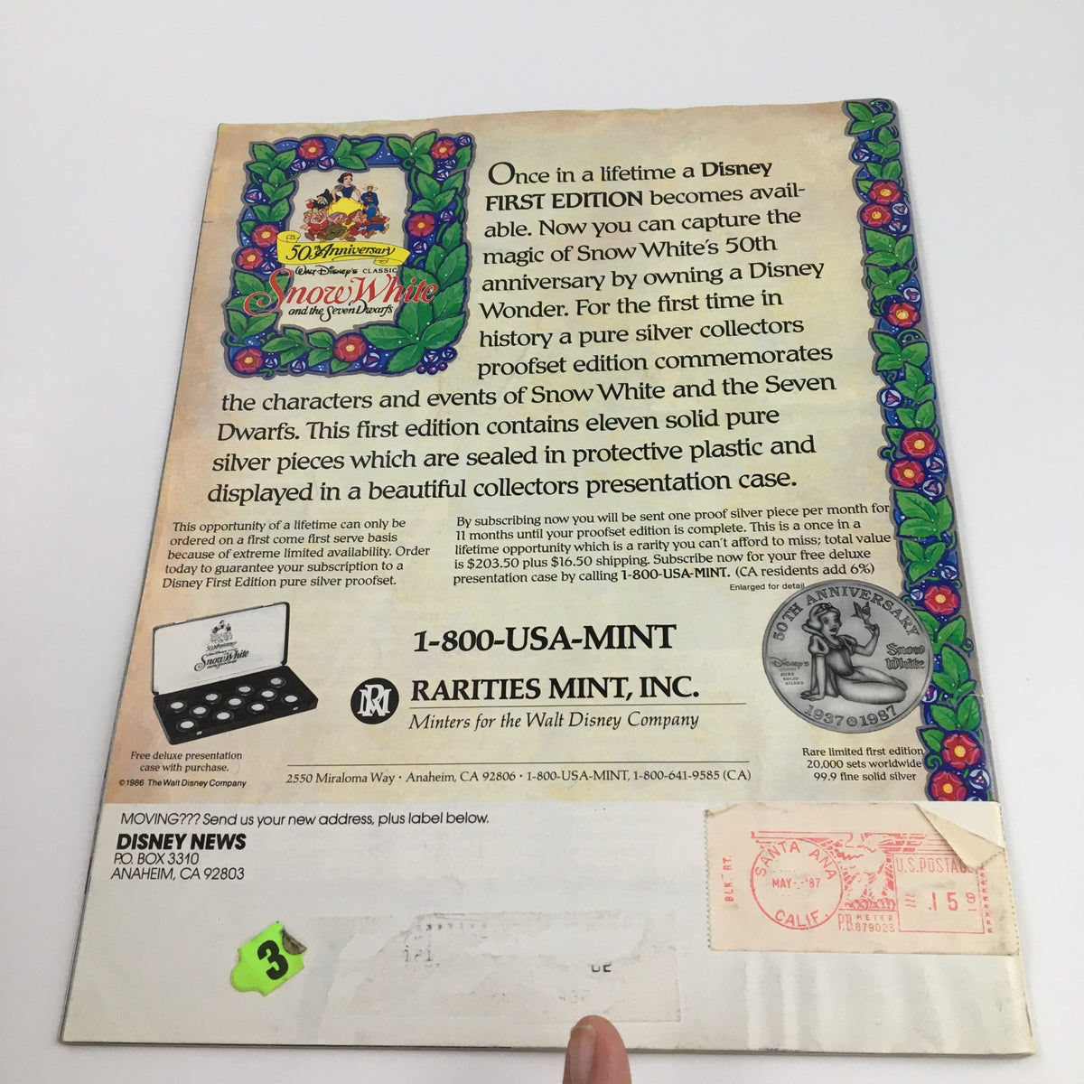 Back cover of 'Disney News Magazine Summer 1987' showcasing a promotional offer for a pure silver collectors proof edition celebrating Snow White's 50th anniversary.