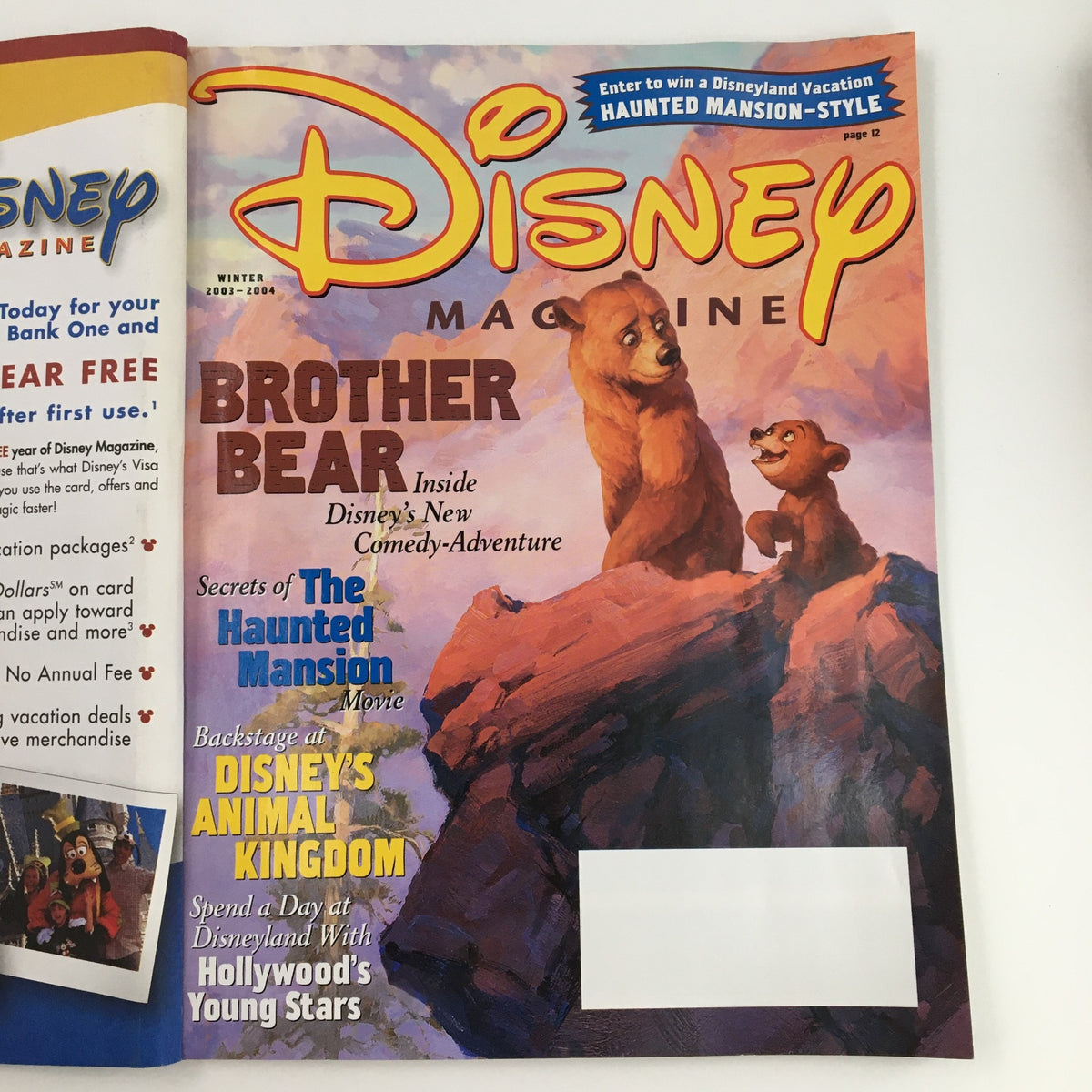 Disney Magazine Winter 2002 featuring Brother Bear, showcasing elements from the Secrets of The Haunted Mansion movie, with vibrant cover art highlighting Disney's animated classic.