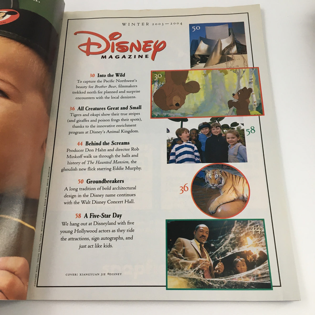 Disney Magazine Winter 2002 featuring insights on Brother Bear and Secrets of The Haunted Mansion, showcasing illustrations and highlights from both films.