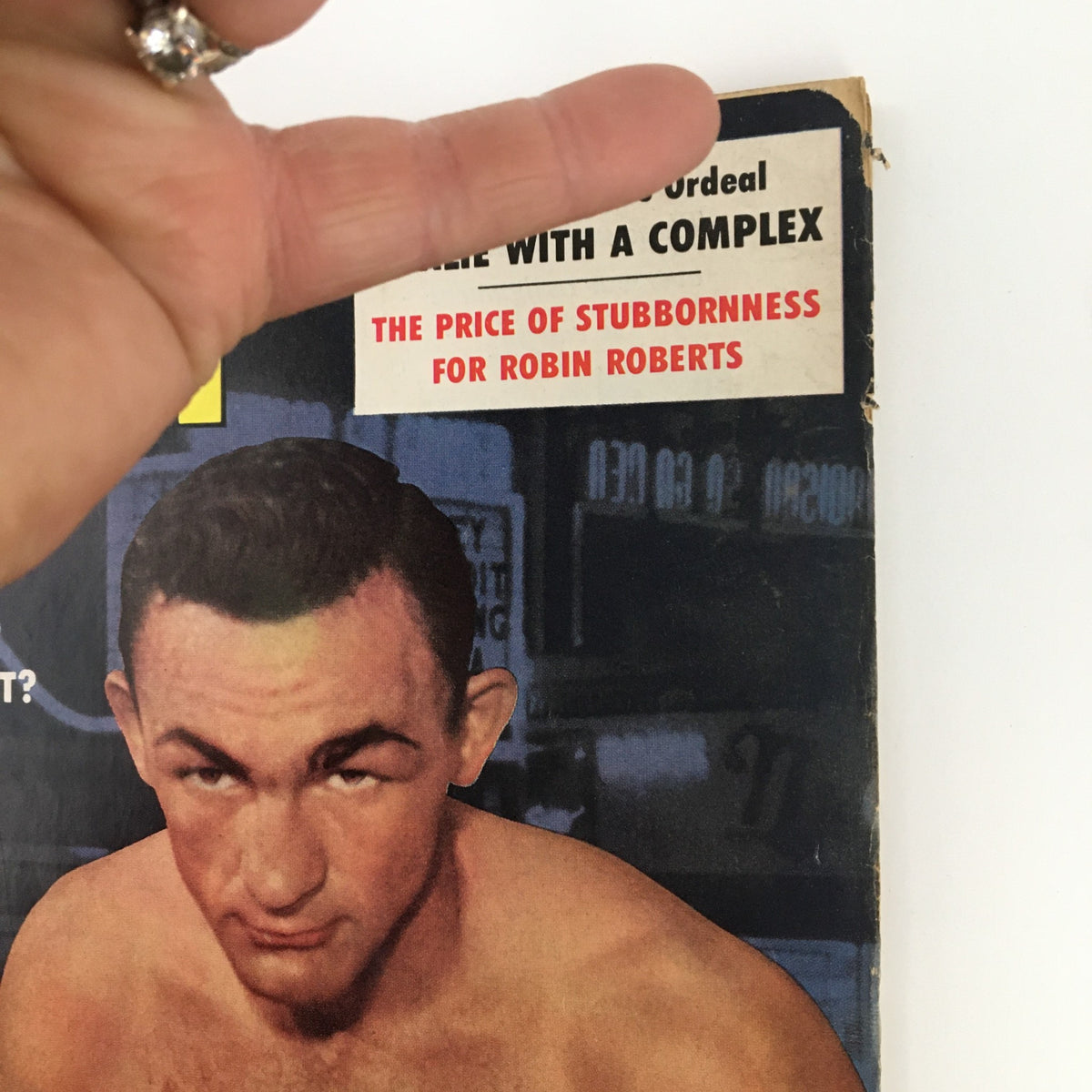 Close-up of the February 1958 Sport Magazine cover highlighting Bob Pettit and additional articles, emphasizing its collectible nature.