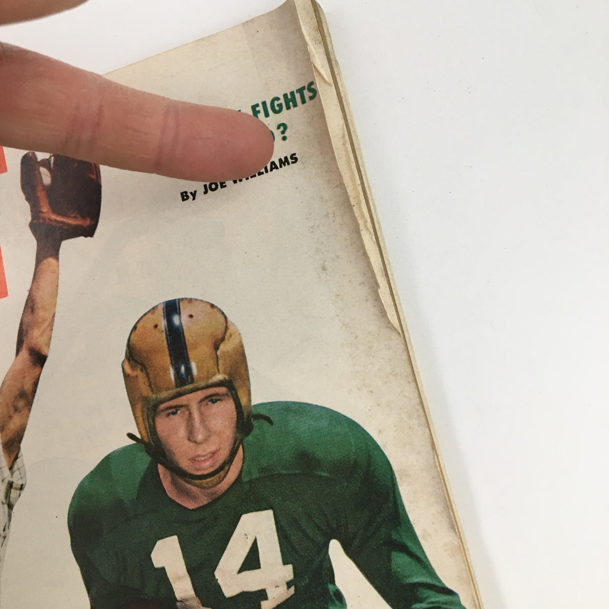 Inset view of Sport Magazine November 1953 cover, focusing on Johnny Lattner in football gear and the article title about fixed fights, adding to its nostalgic appeal.
