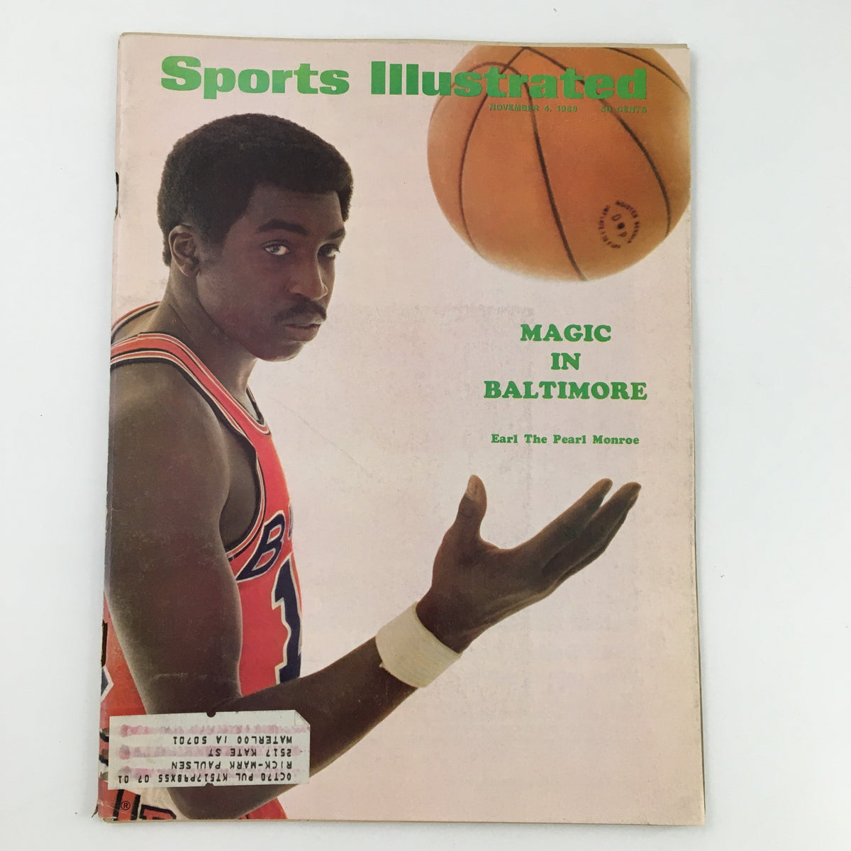 Cover of Sports Illustrated Magazine from November 4, 1968, featuring NBA star Earl 'The Pearl' Monroe, showcasing his basketball prowess with a spinning basketball and the headline 'Magic in Baltimore'.