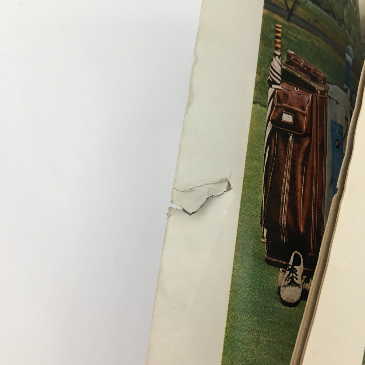 Damaged edge close-up of Sports Illustrated Magazine March 20 1967, highlighting nostalgic sports memorabilia, including the iconic Scooter Line.