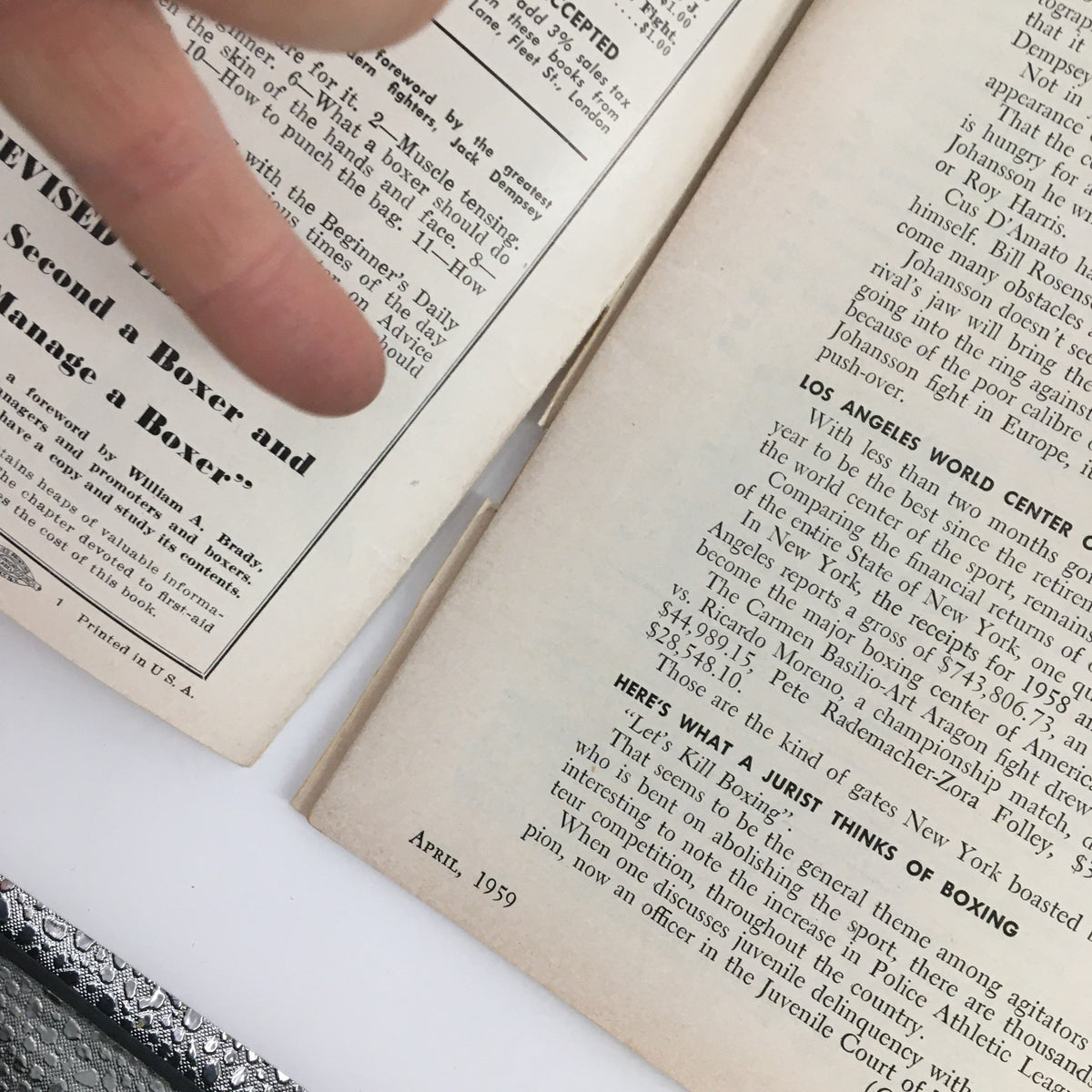 Inside page of The Ring Boxing Magazine April 1959 displaying articles related to boxing and featuring the page layout.