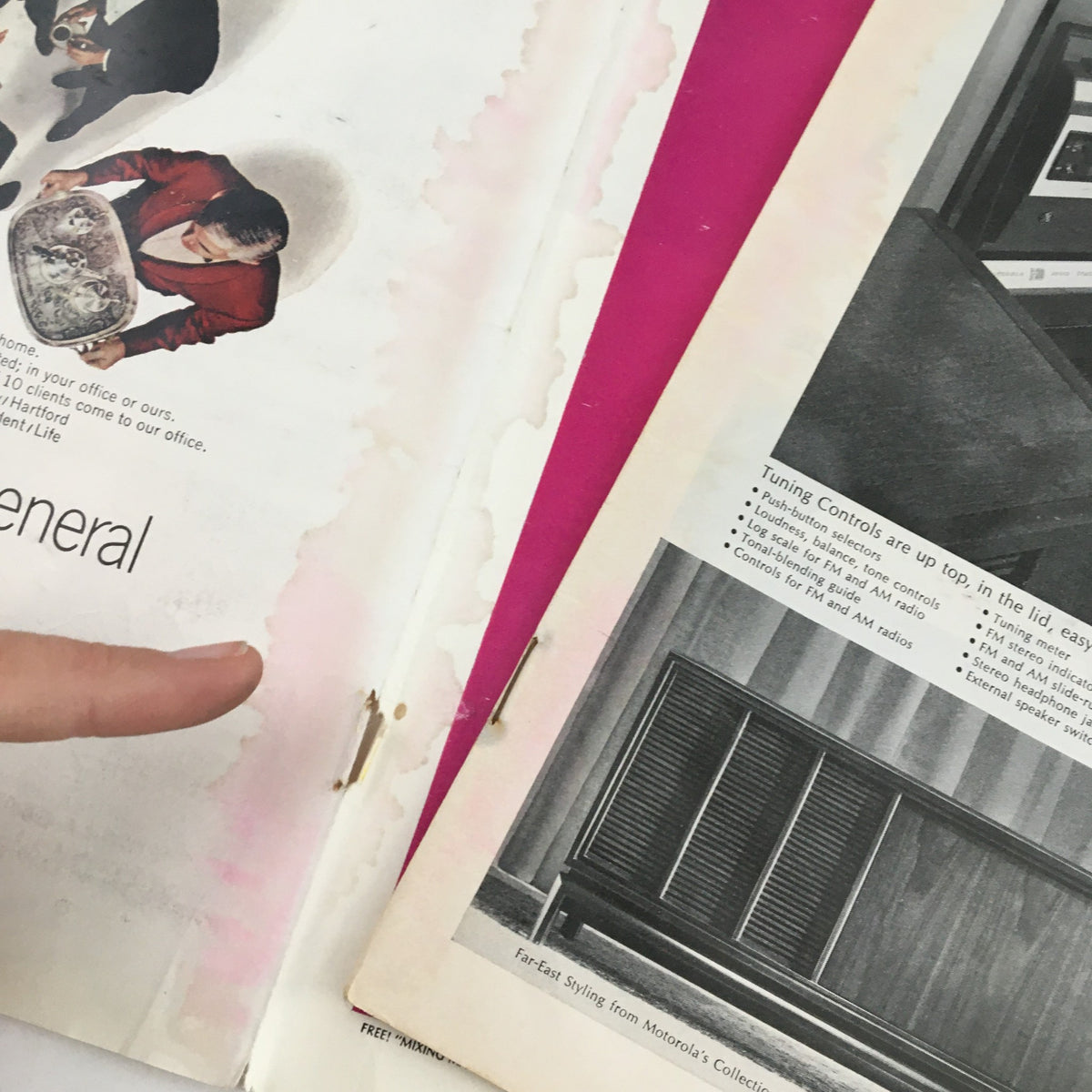 Close-up of aged pages from Sports Illustrated Magazine February 14, 1966, displaying vintage ads and wear marks highlighting its collectible nature.