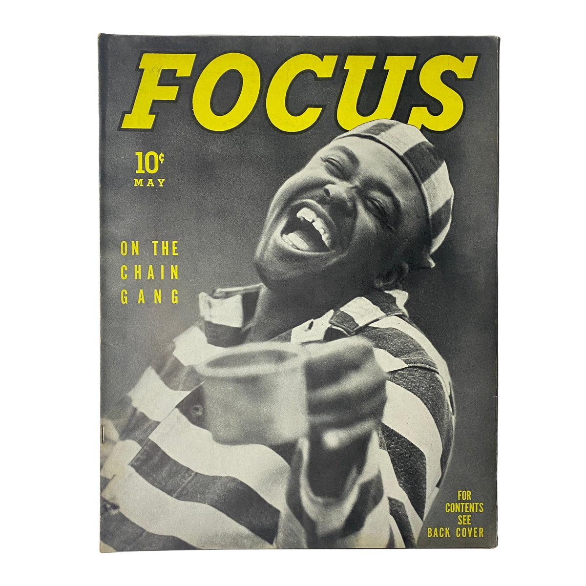 Cover of Focus Magazine, May 1938, featuring the title 'Focus' prominently displayed above an image of a man in striped prison attire, laughing and holding a metal cup, with a feature article about 'The Chain Gang System.'