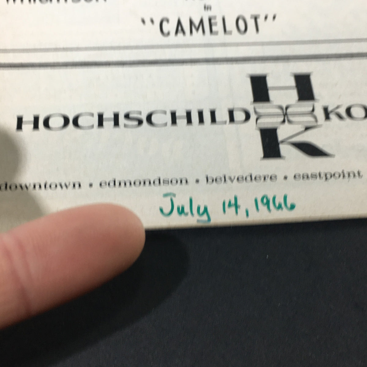 Close-up of the vintage program from the Painters Mill Music Fair dated July 14, 1966, featuring the date and title 'Camelot' written in green.