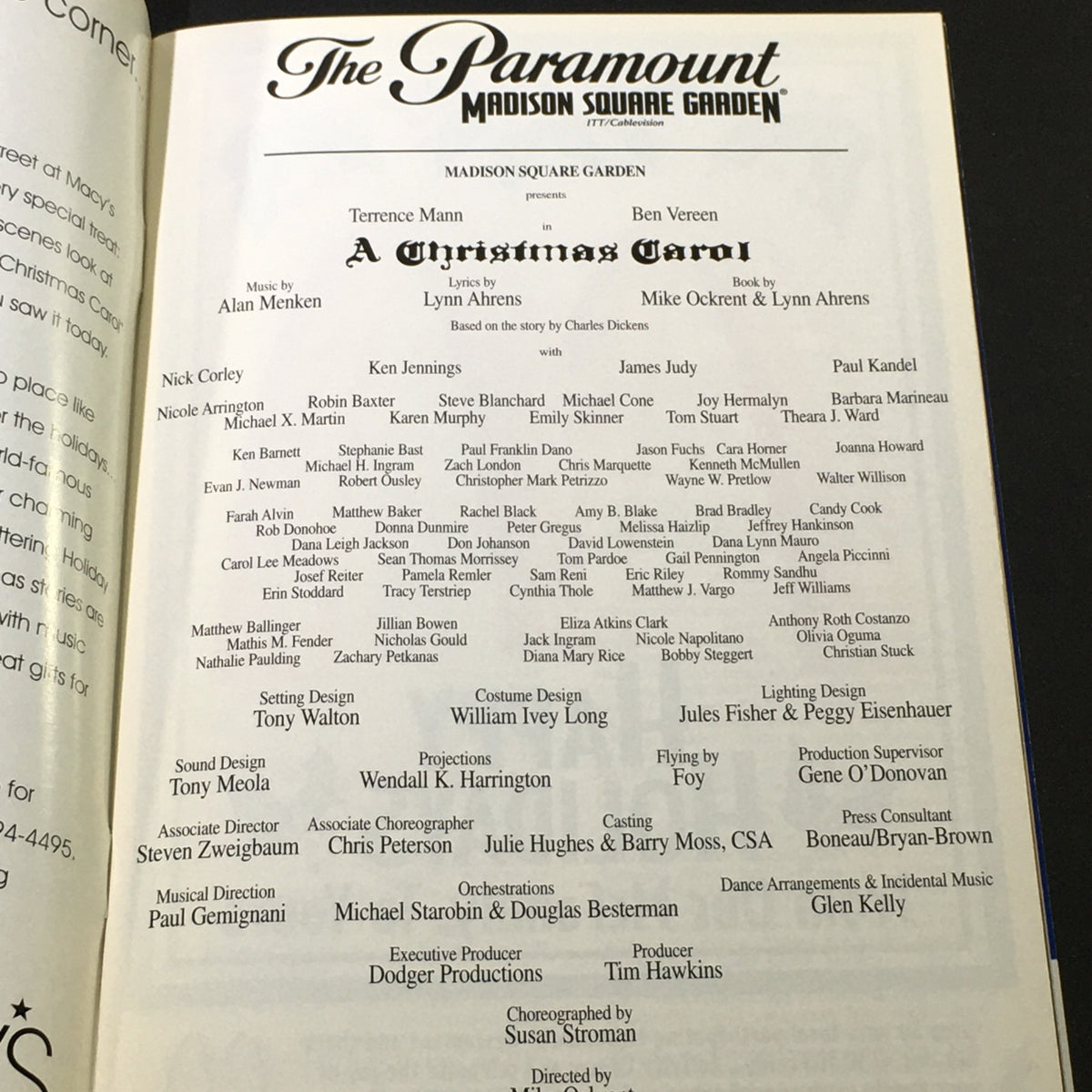 Another page from the vintage magazine 'A Christmas Carol 1995' at The Paramount Madison Square Garden, listing the full cast and crew of the production.