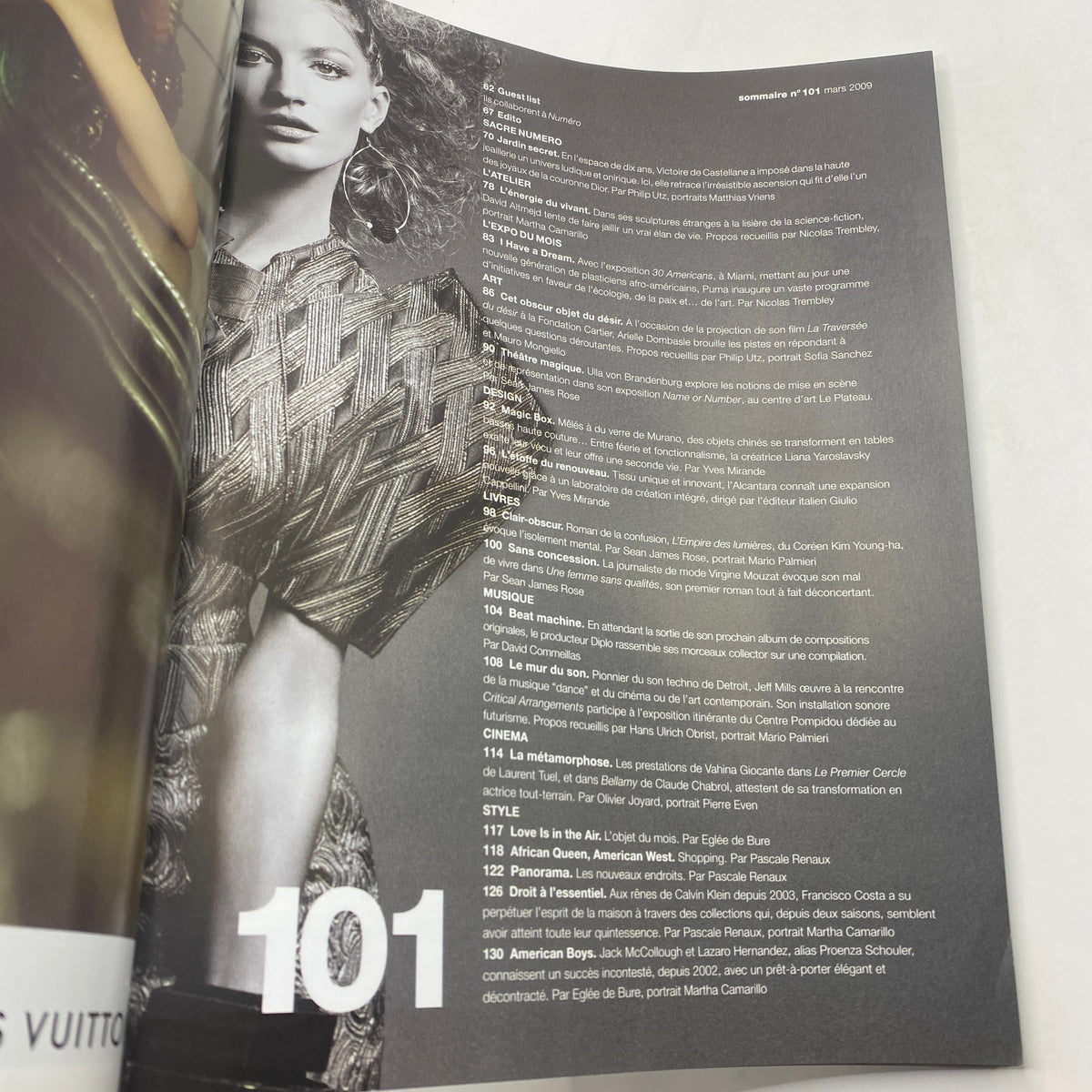 Inside page of Numéro Magazine March 2009 featuring editorial content with model styled in high fashion.