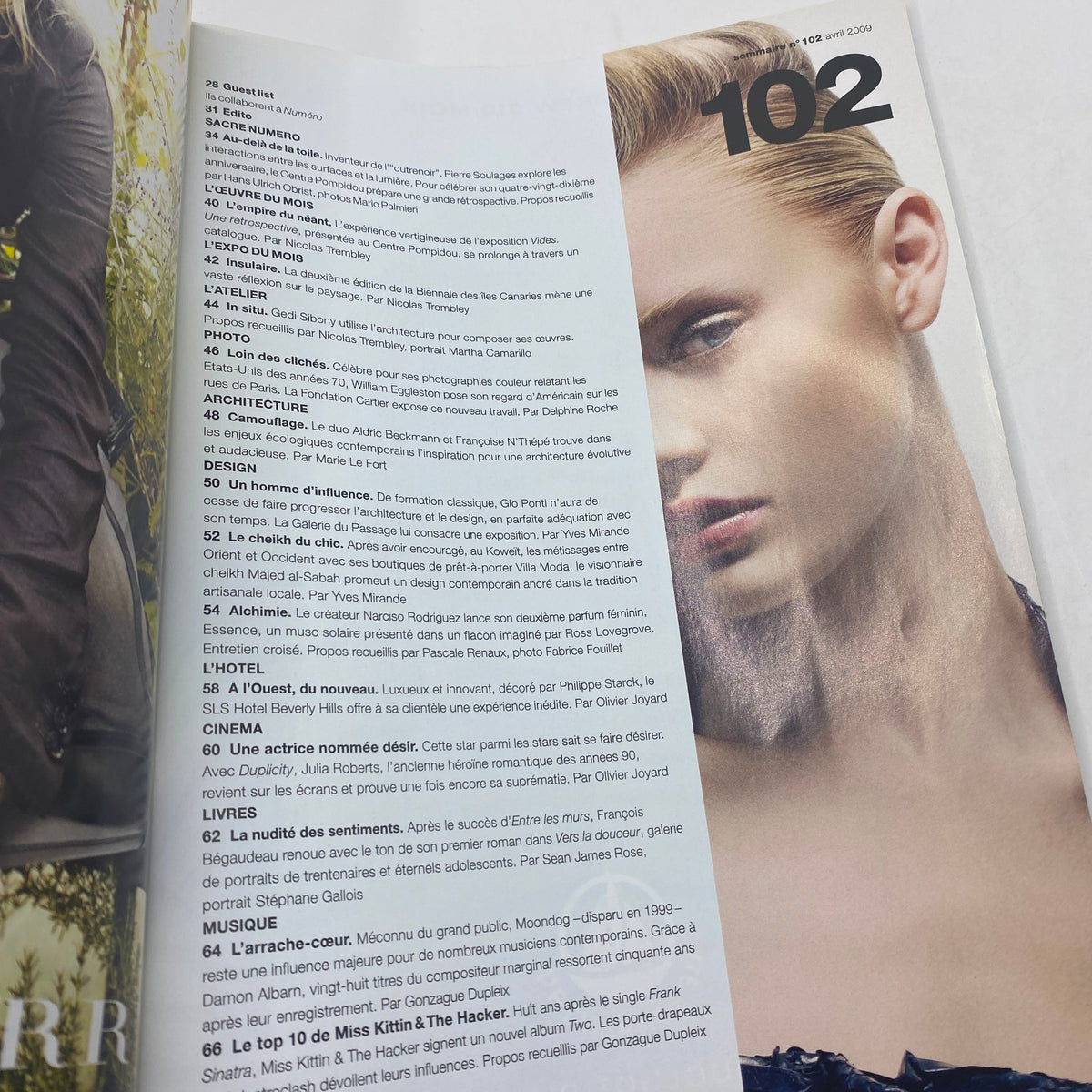 Interior page of Numéro Magazine April 2009 No. 102 displaying articles and features, showcasing the magazine's content and layout.