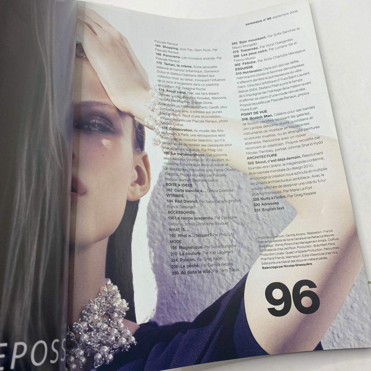 Interior page of Numéro Magazine September 2008 No. 96 displaying editorial content and fashion listings.