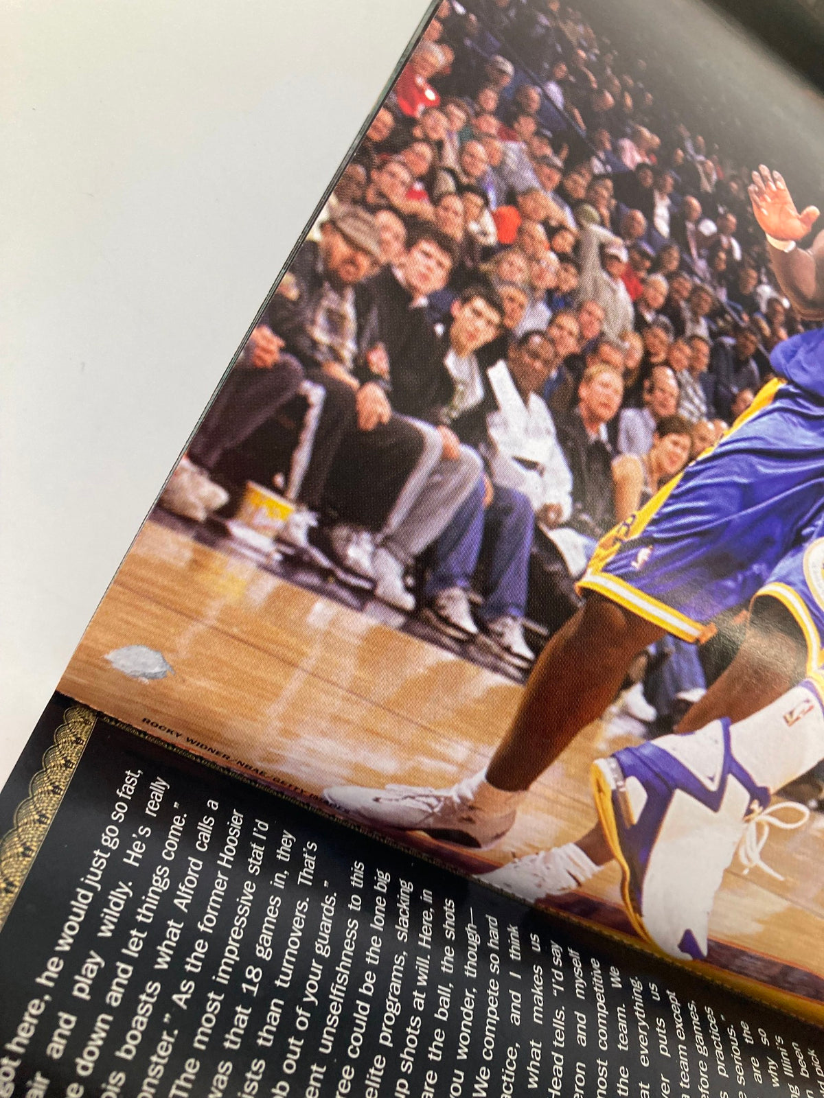 Slam Magazine May 2005 featuring Miami Heat Dwyane Wade and Steve Nash, showcasing a dynamic basketball scene with fans in attendance.