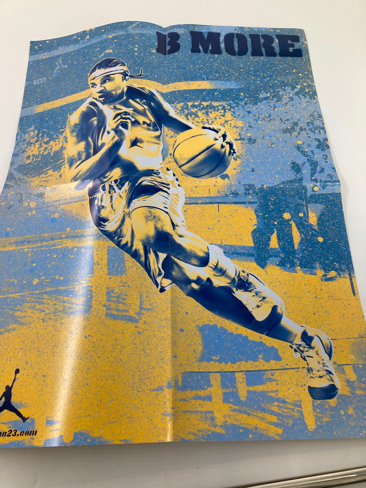 Slam Magazine February 2005 exclusive poster featuring a dynamic basketball player in action, embodying the essence of the sport.